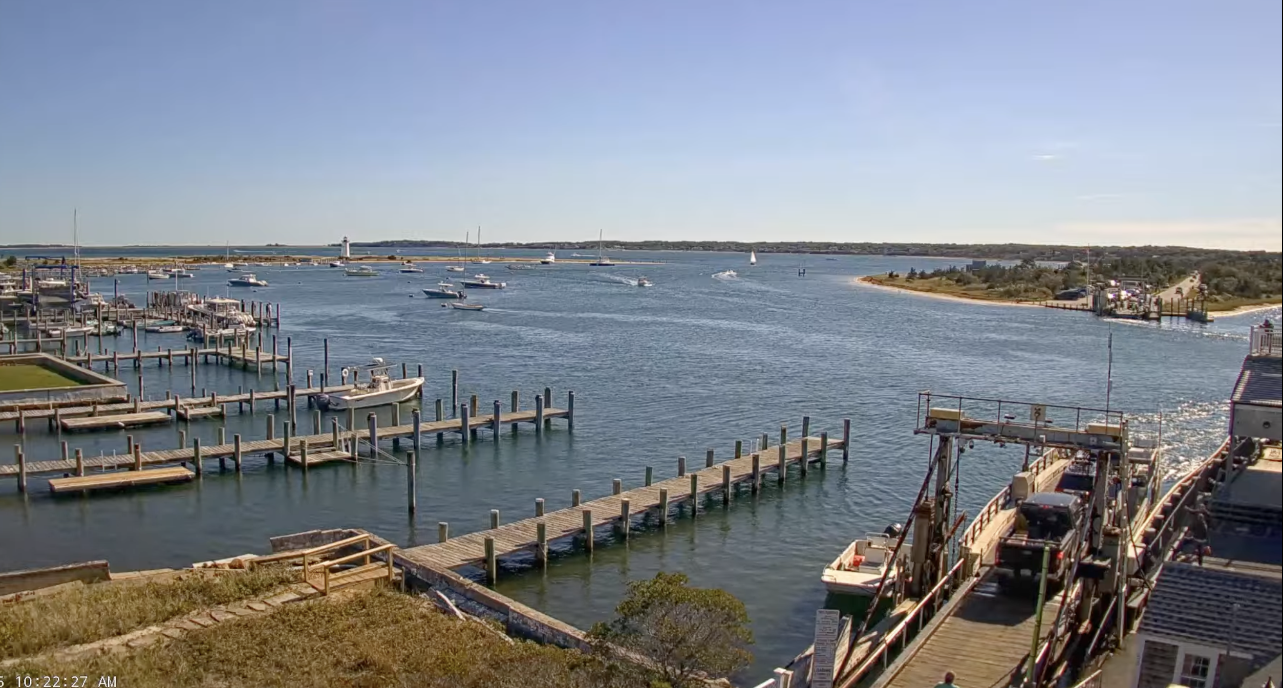 Live view of the Chappaquiddick Ferry carrying cars and passengers across Edgartown Harbor on Martha's Vineyard.