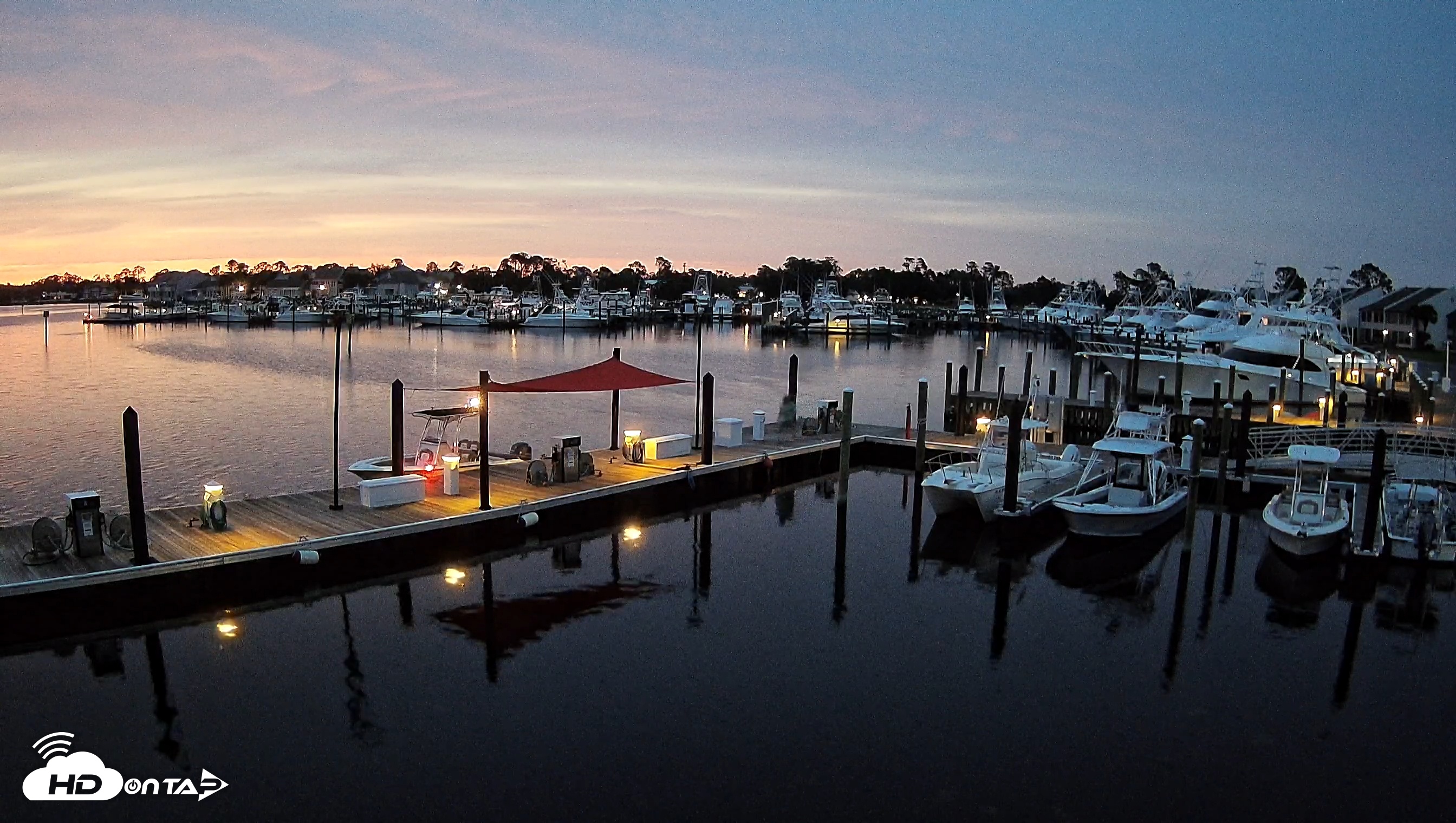 Snapshot of Point South Bay Point Marina Live Webcam taken May 21, 2025, 7:55pm CDT