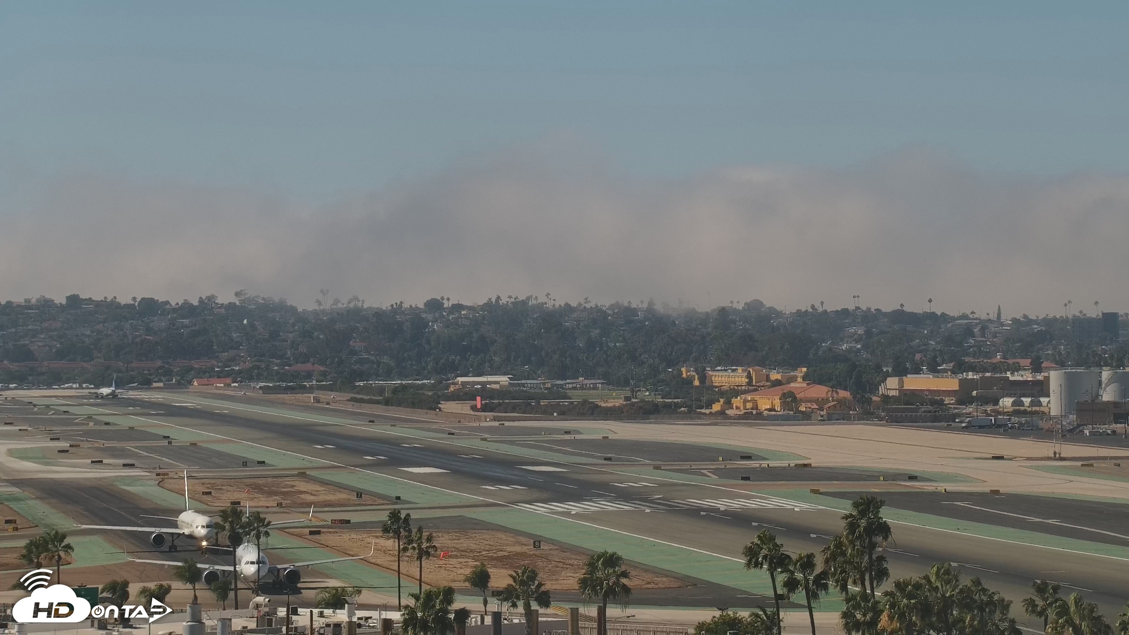 Snapshot of SD Lindbergh Airport & Bay Live Webcam taken Oct 7, 2026, 2:27pm PDT