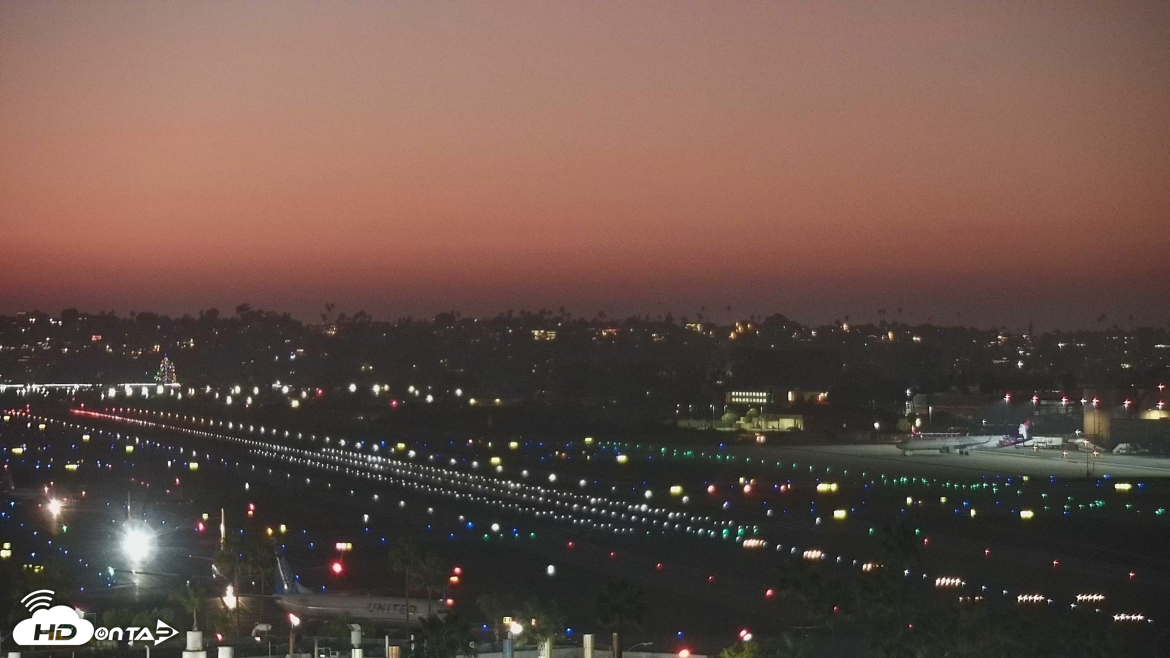 Snapshot of SD Lindbergh Airport & Bay Live Webcam taken Dec 18, 2025, 5:26pm PST