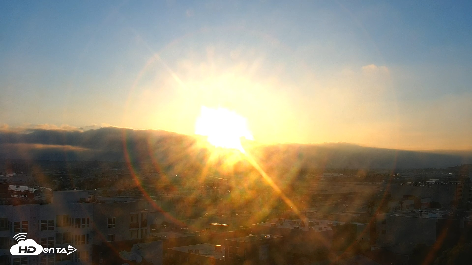 Snapshot of SD Lindbergh Airport & Bay Live Webcam taken Jul 13, 2025, 7:34pm PDT