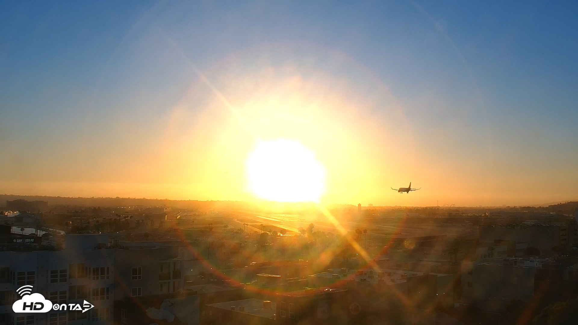 Snapshot of SD Lindbergh Airport & Bay Live Webcam taken Jul 10, 2025, 7:39pm PDT