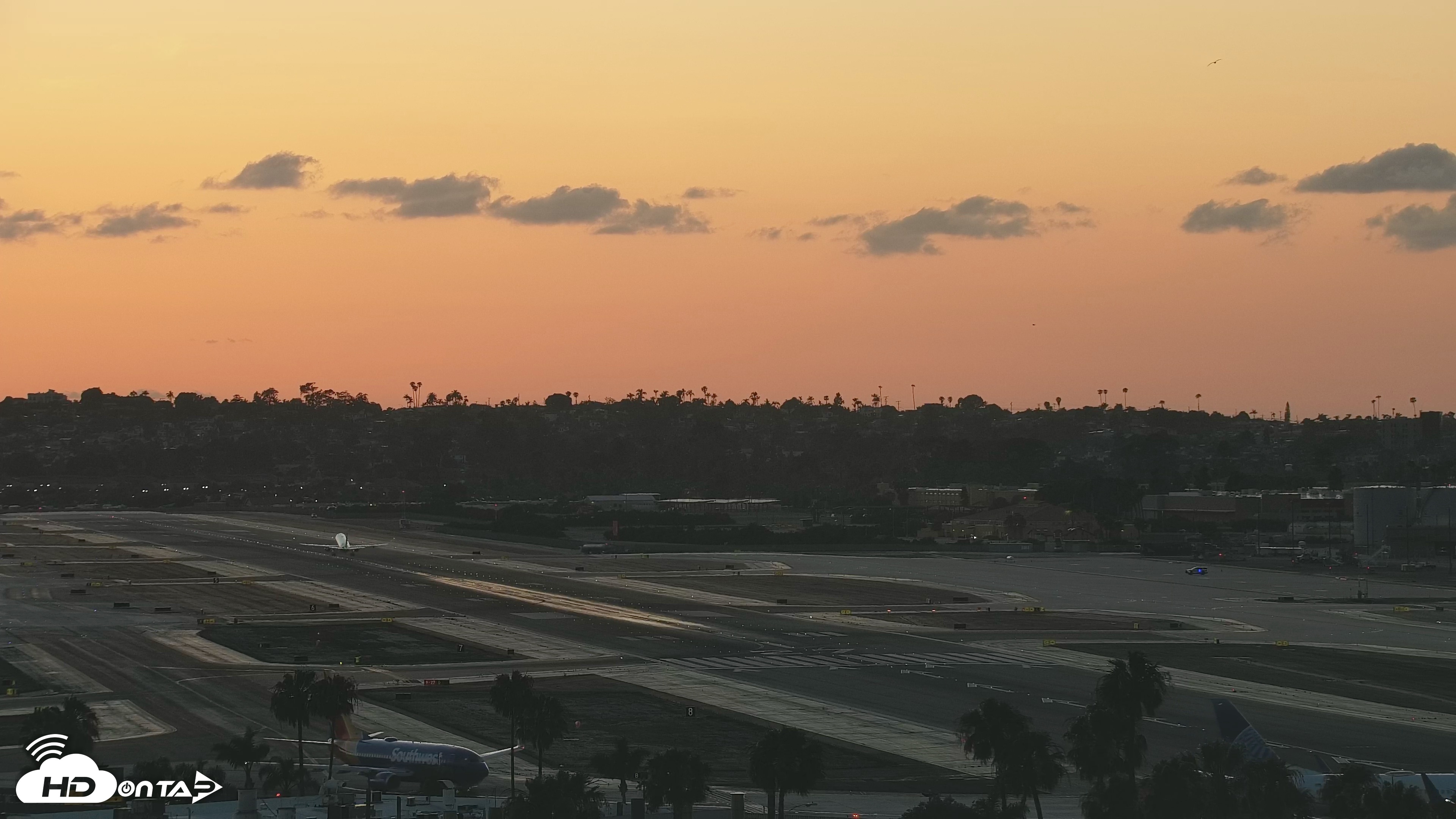 Snapshot of SD Lindbergh Airport & Bay Live Webcam taken Apr 27, 2026, 7:32pm PDT