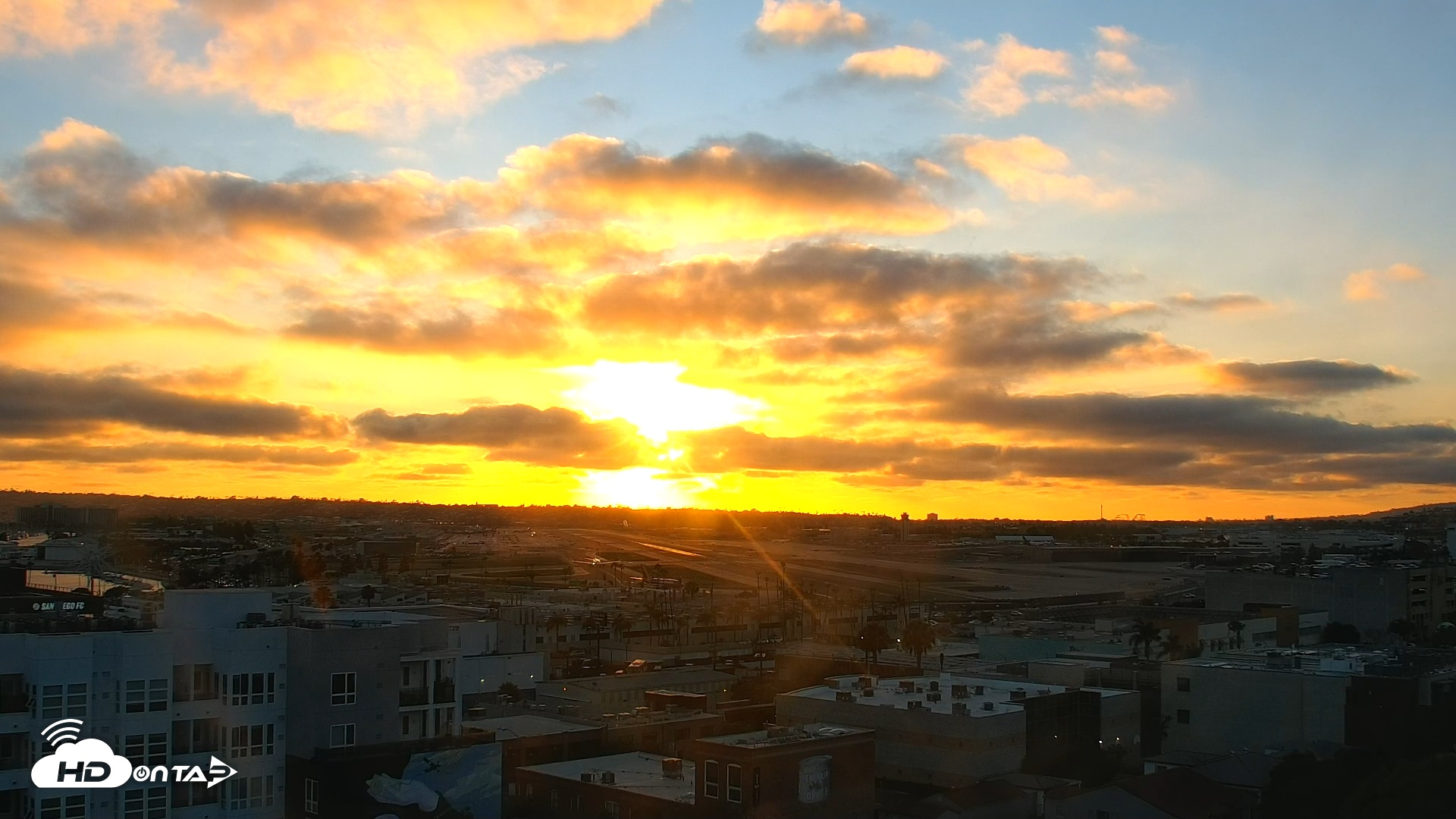 Snapshot of SD Lindbergh Airport & Bay Live Webcam taken Jul 23, 2025, 7:36pm PDT