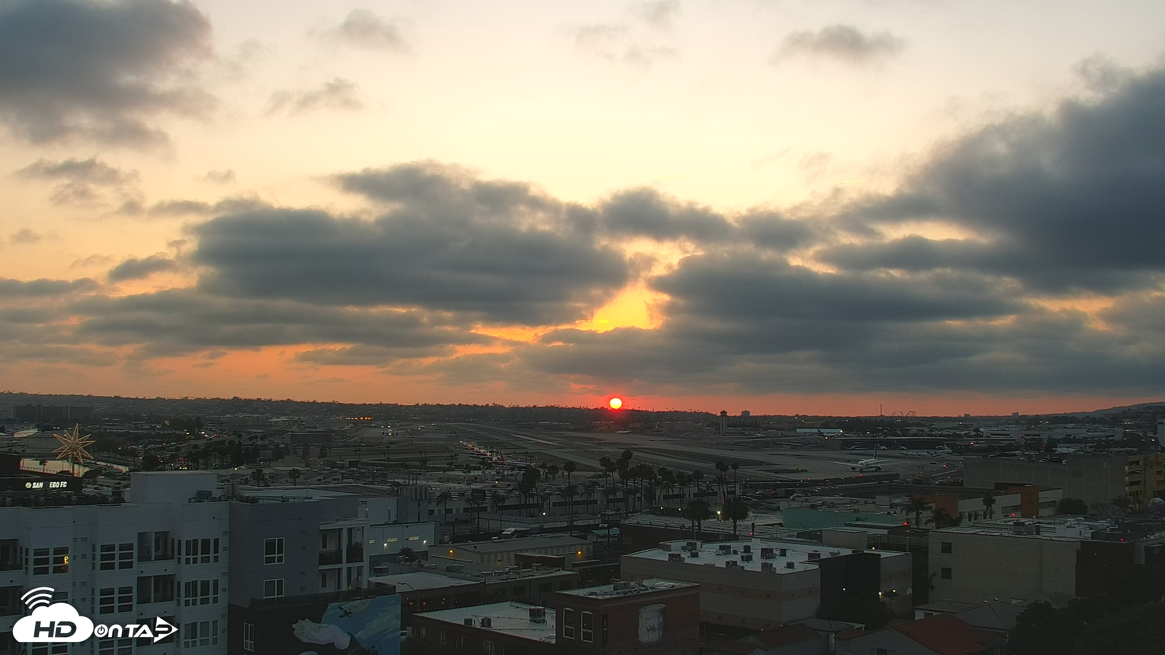 Snapshot of SD Lindbergh Airport & Bay Live Webcam taken May 29, 2025, 7:47pm PDT