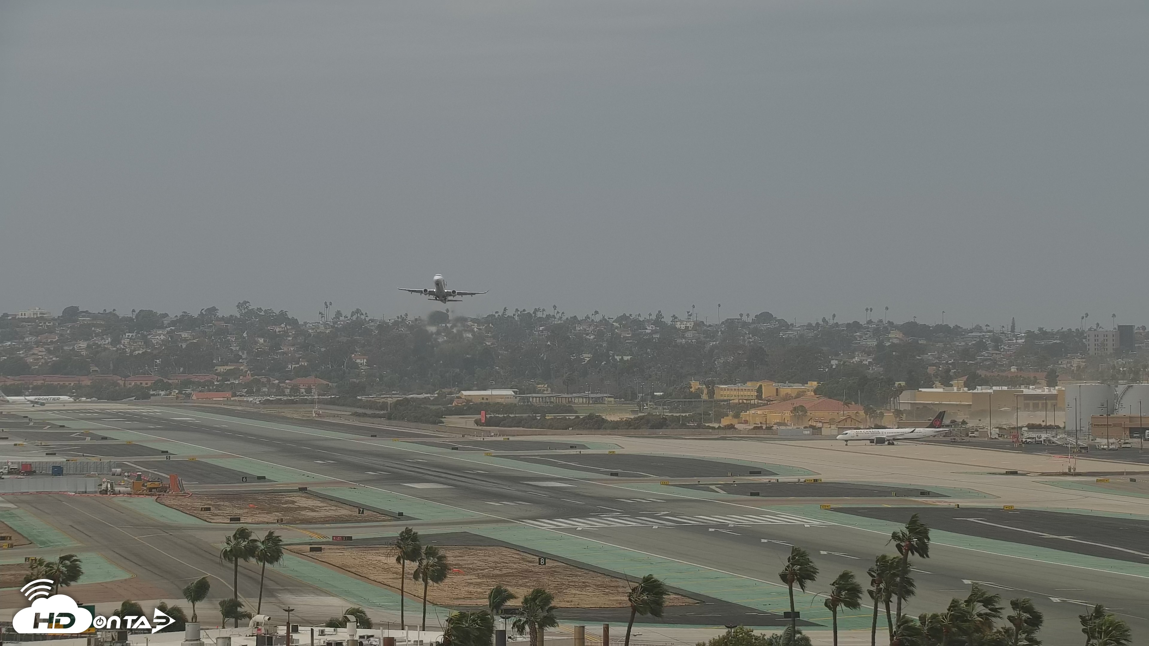 Snapshot of SD Lindbergh Airport & Bay Live Webcam taken Dec 24, 2025, 12:27pm PST