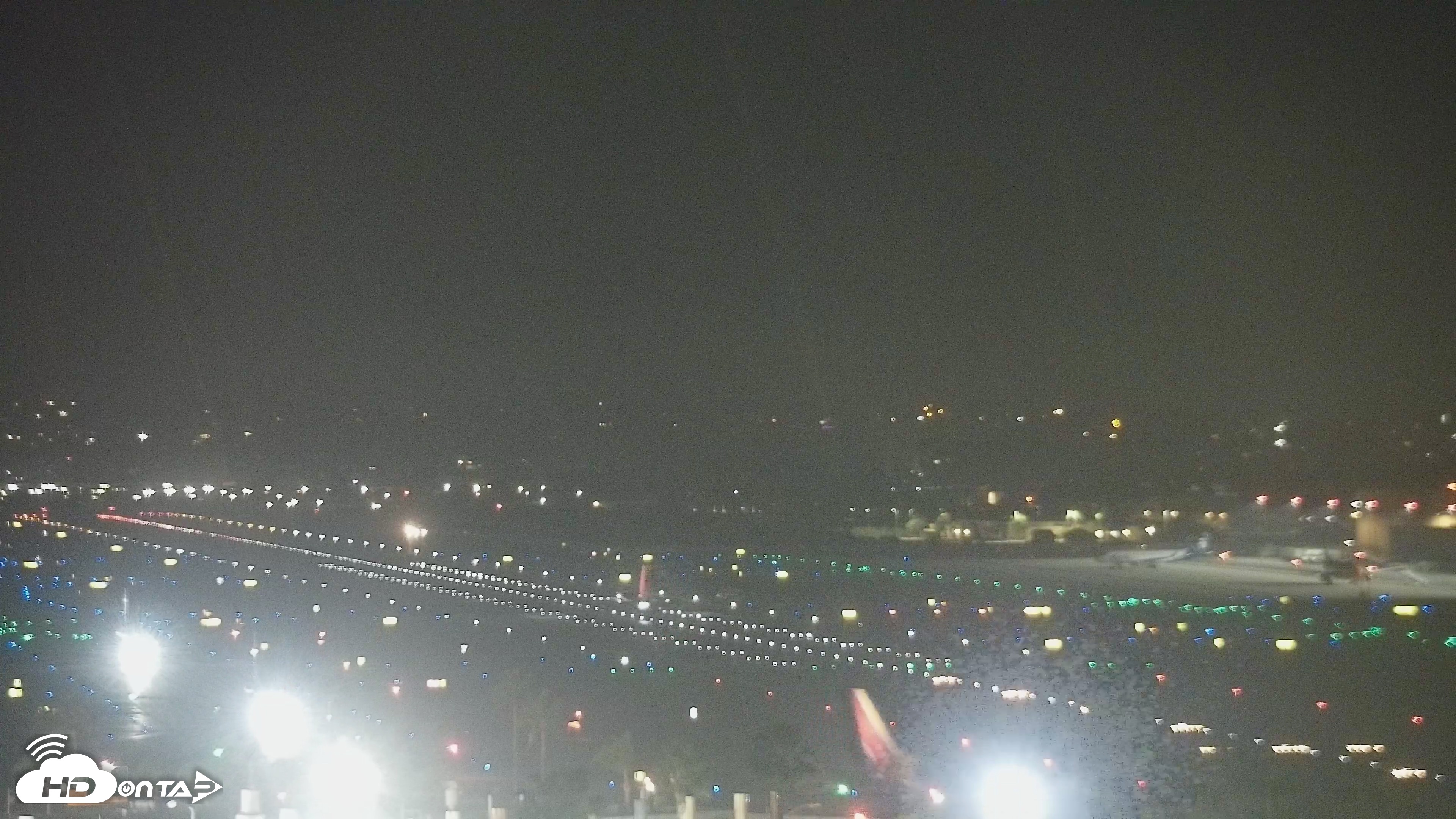 Snapshot of SD Lindbergh Airport & Bay Live Webcam taken Oct 8, 2026, 10:47pm PDT