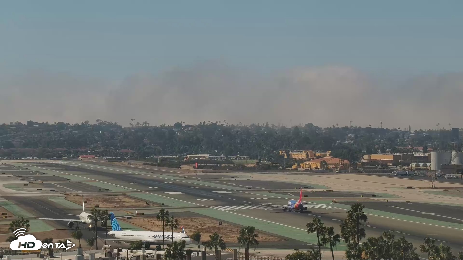Snapshot of SD Lindbergh Airport & Bay Live Webcam taken Oct 7, 2026, 2:28pm PDT