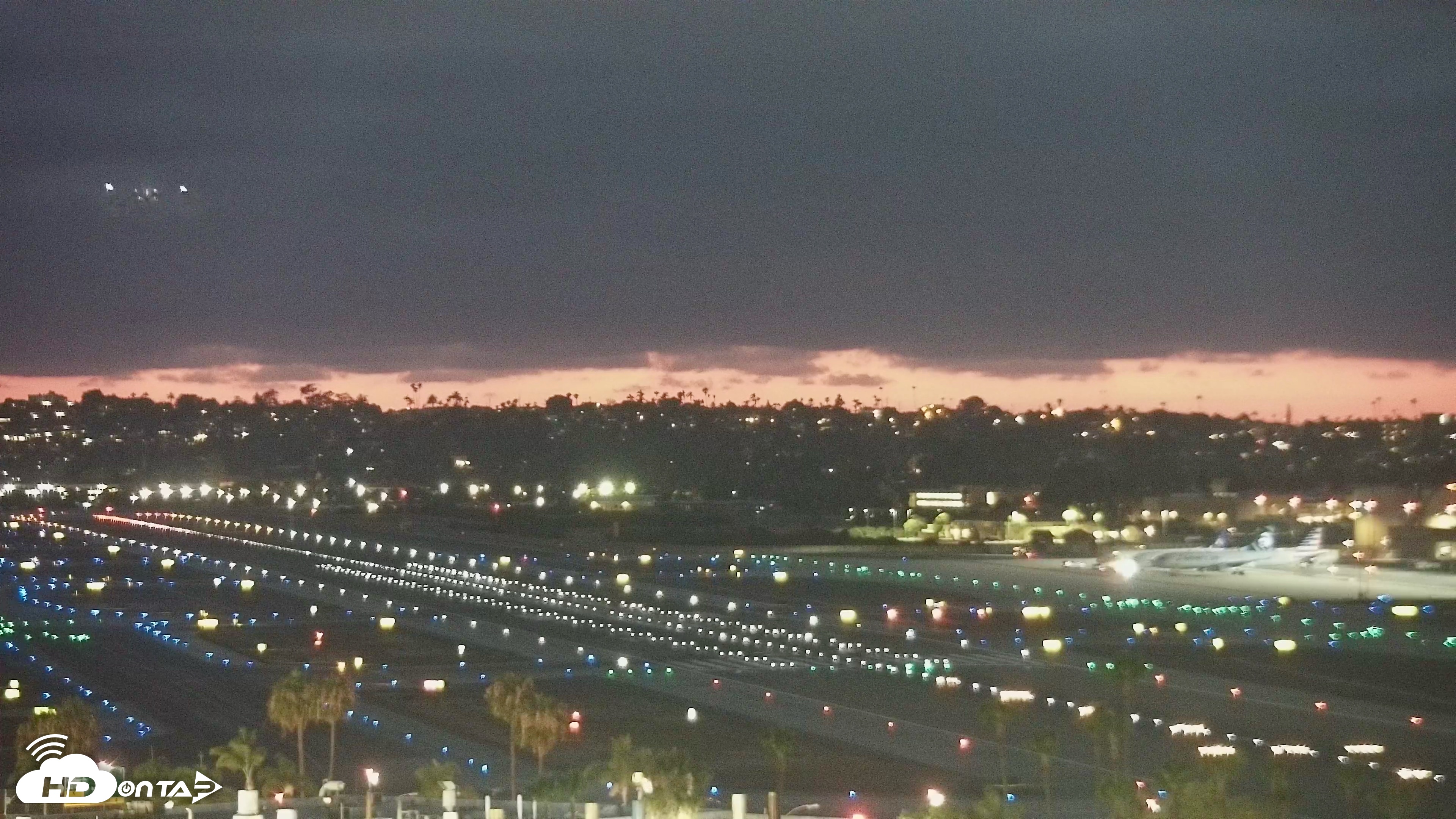 Snapshot of SD Lindbergh Airport & Bay Live Webcam taken Jun 19, 2026, 8:38pm PDT