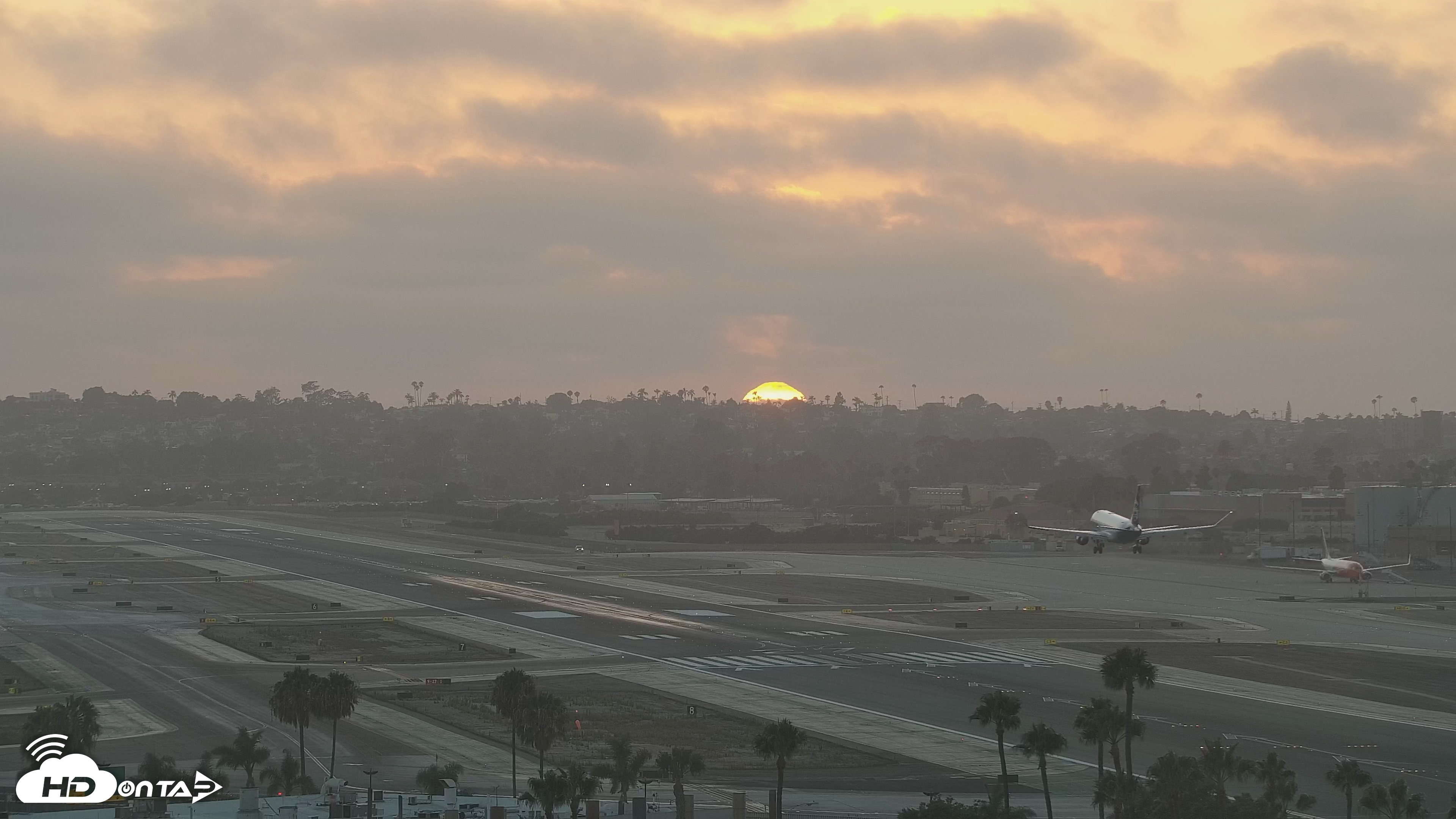 Snapshot of SD Lindbergh Airport & Bay Live Webcam taken Jul 23, 2026, 7:52pm PDT