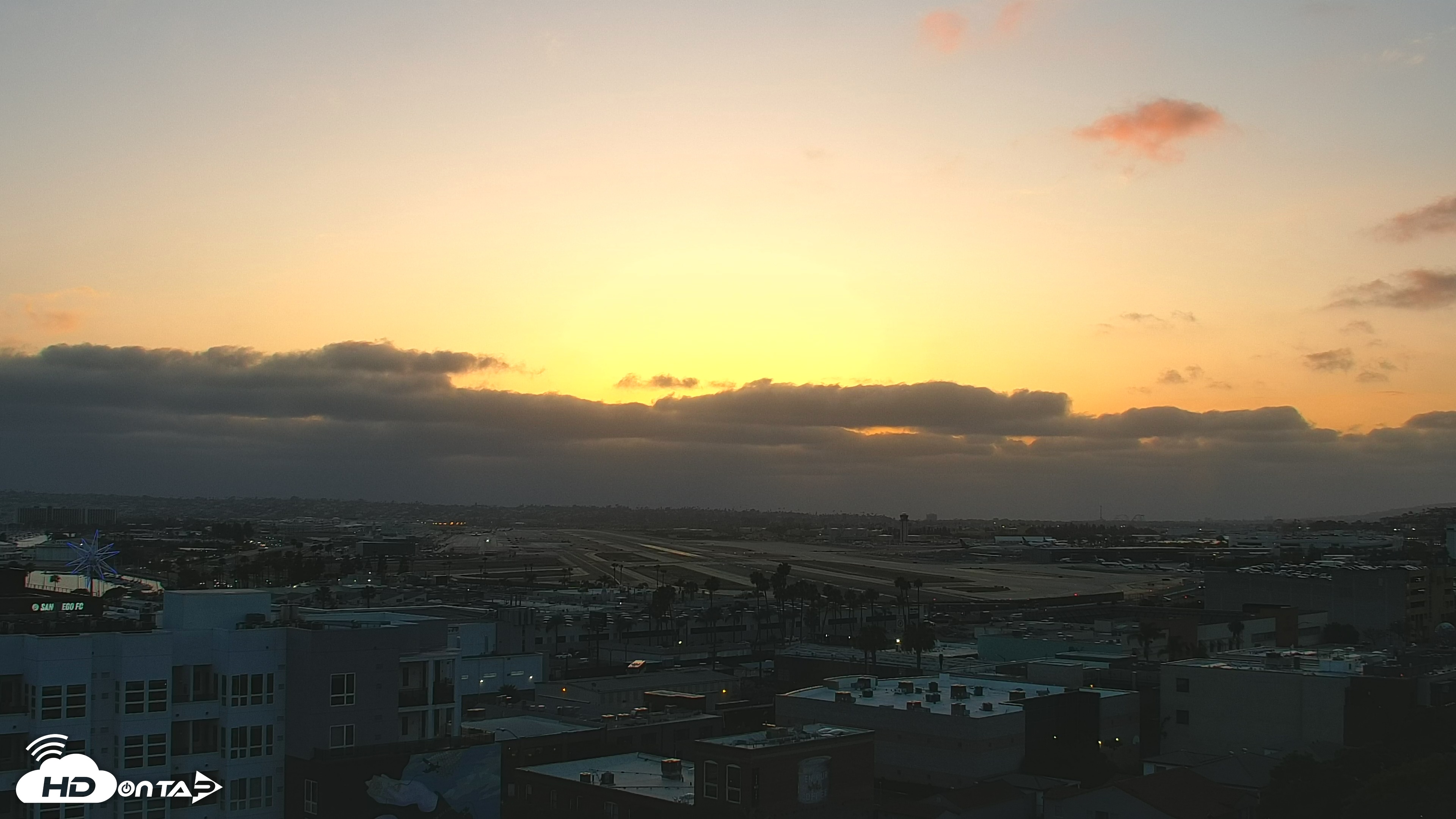 Snapshot of SD Lindbergh Airport & Bay Live Webcam taken May 24, 2025, 7:41pm PDT