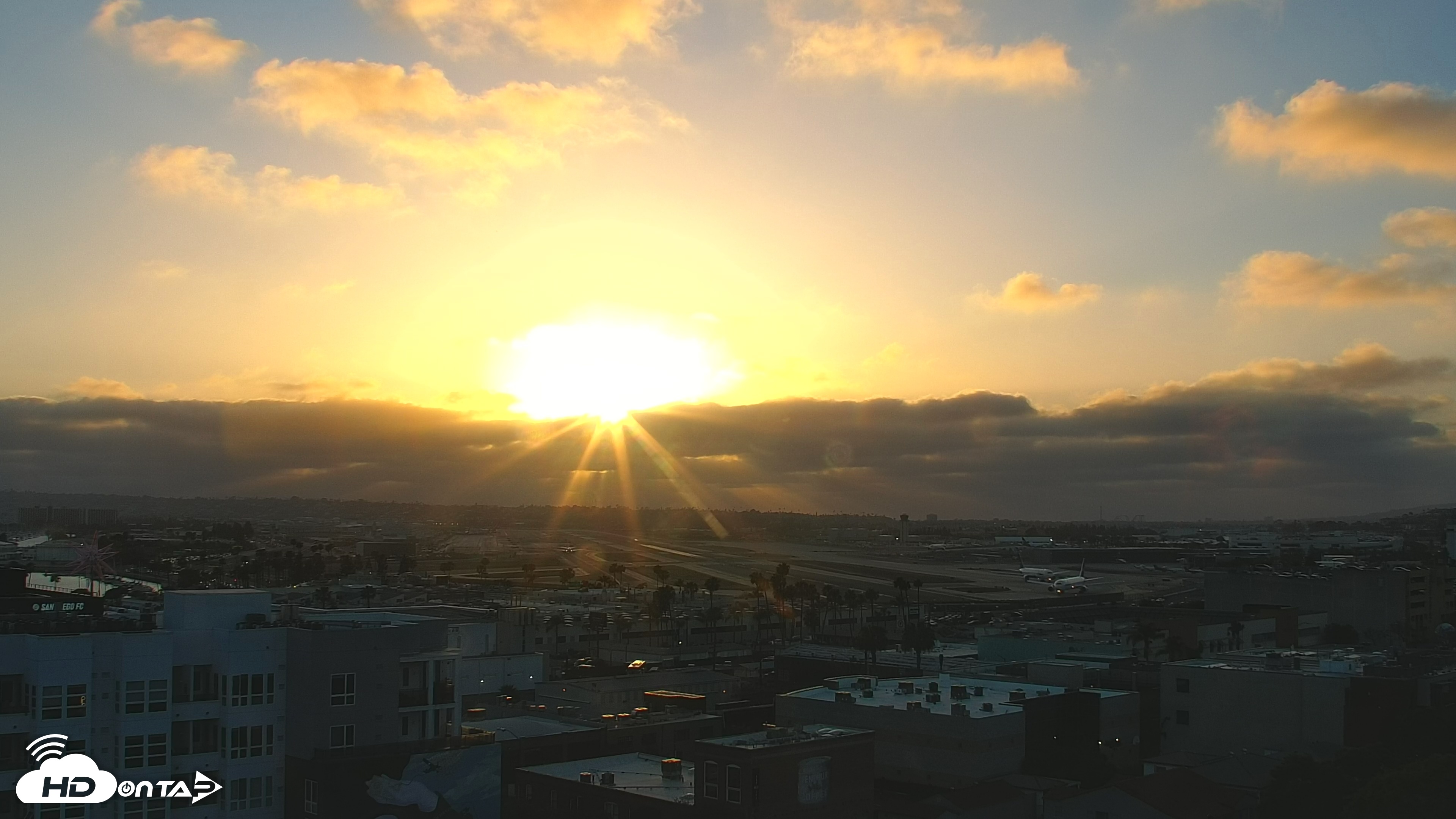 Snapshot of SD Lindbergh Airport & Bay Live Webcam taken May 15, 2025, 7:18pm PDT