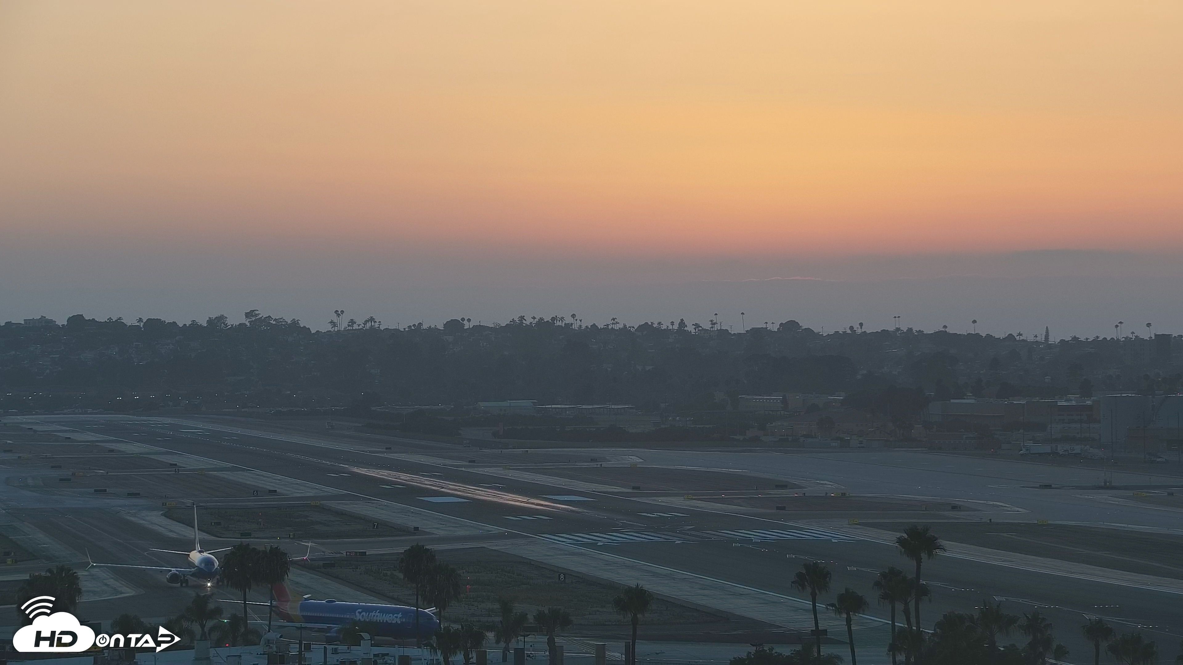 Snapshot of SD Lindbergh Airport & Bay Live Webcam taken Jul 19, 2026, 7:55pm PDT