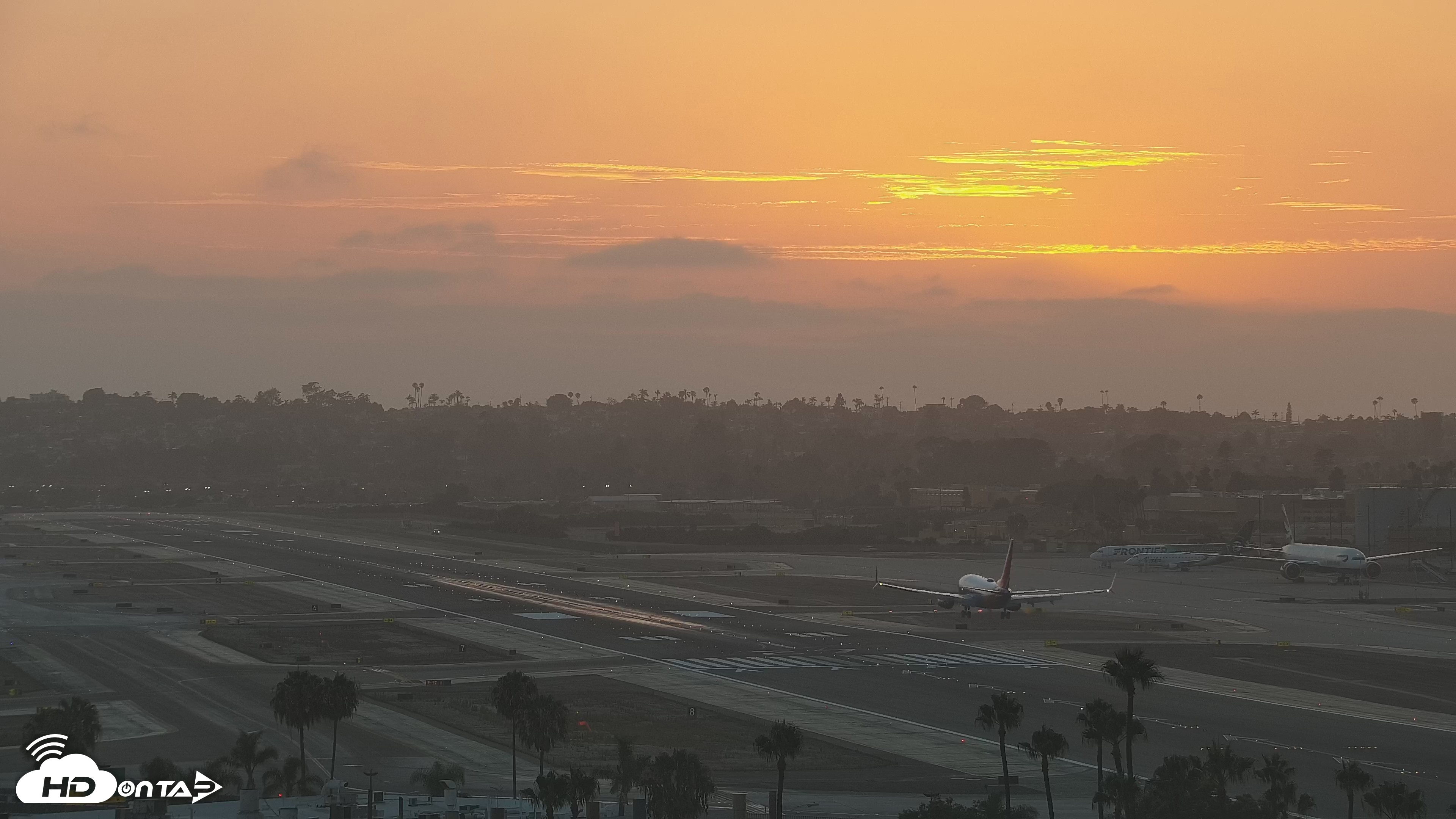 Snapshot of SD Lindbergh Airport & Bay Live Webcam taken Jul 17, 2026, 7:56pm PDT