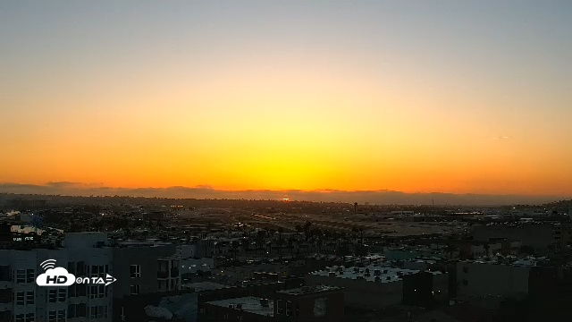 Snapshot of SD Lindbergh Airport & Bay Live Webcam taken May 21, 2025, 7:43pm PDT