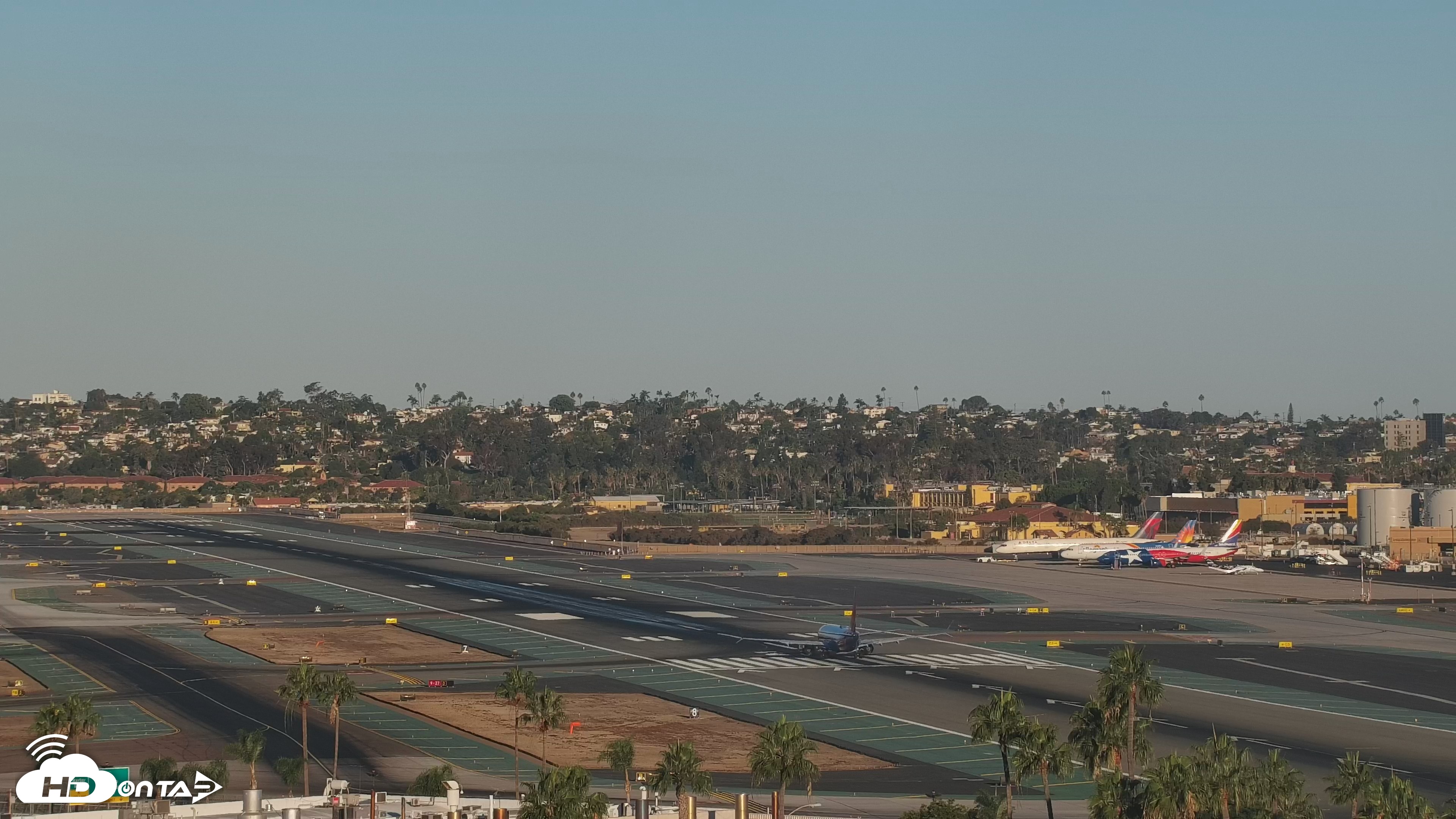 Snapshot of SD Lindbergh Airport & Bay Live Webcam taken Oct 3, 2026, 7:29am PDT