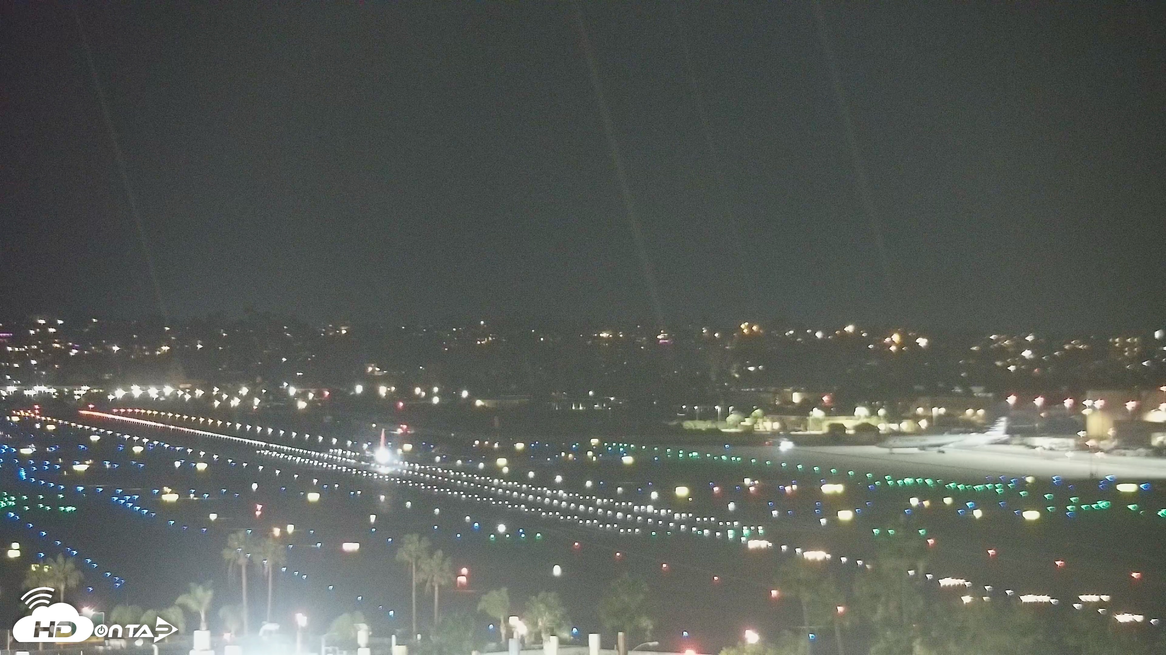 Snapshot of SD Lindbergh Airport & Bay Live Webcam taken Oct 6, 2026, 9:06pm PDT