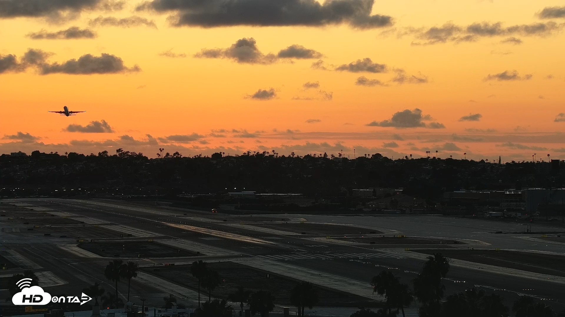 Snapshot of SD Lindbergh Airport & Bay Live Webcam taken May 5, 2026, 7:37pm PDT
