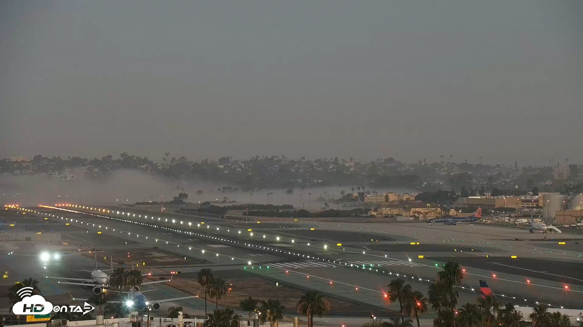 Snapshot of SD Lindbergh Airport & Bay Live Webcam taken Mar 19, 2026, 6:40am PDT