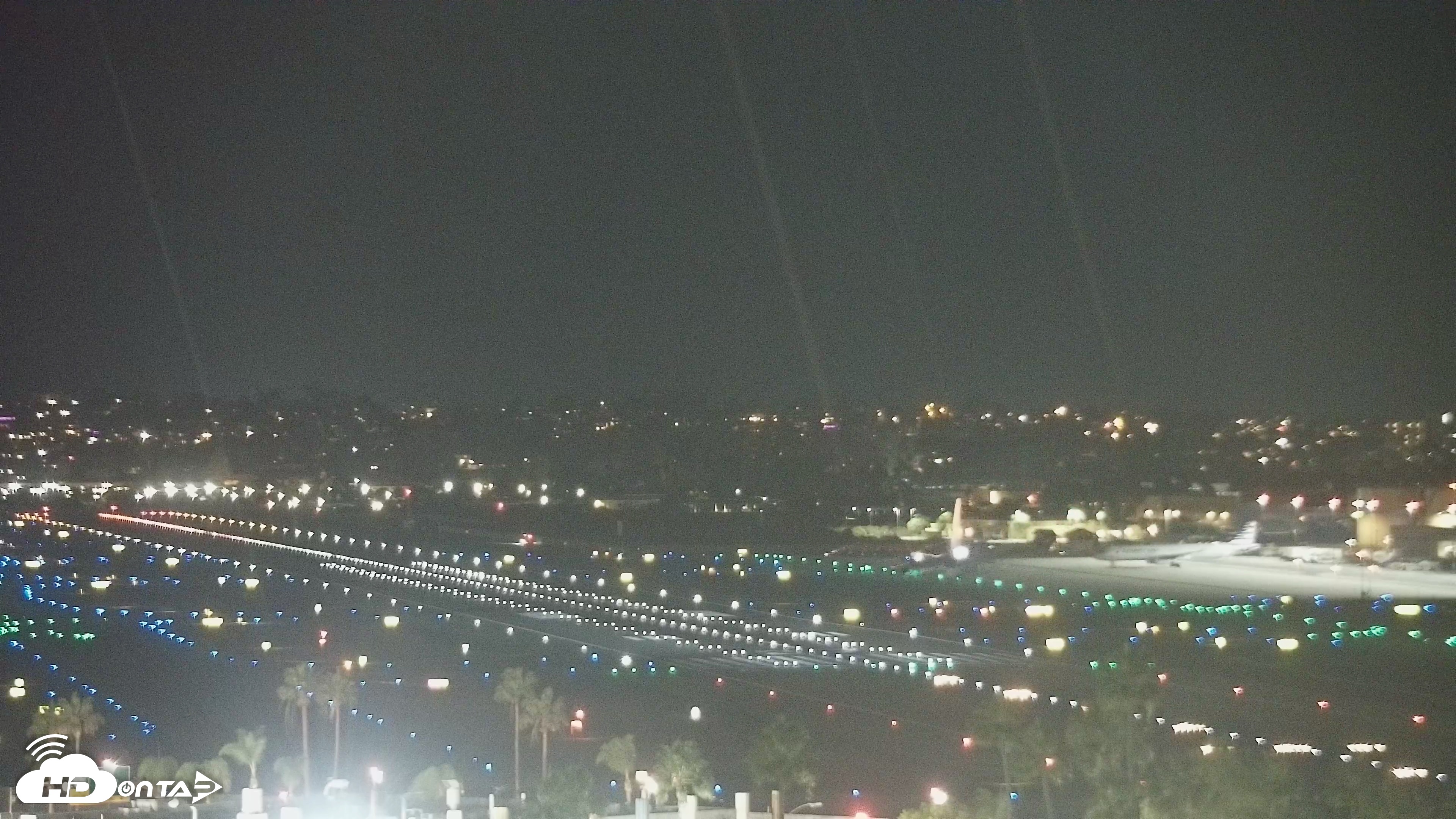 Snapshot of SD Lindbergh Airport & Bay Live Webcam taken Oct 6, 2026, 9:06pm PDT