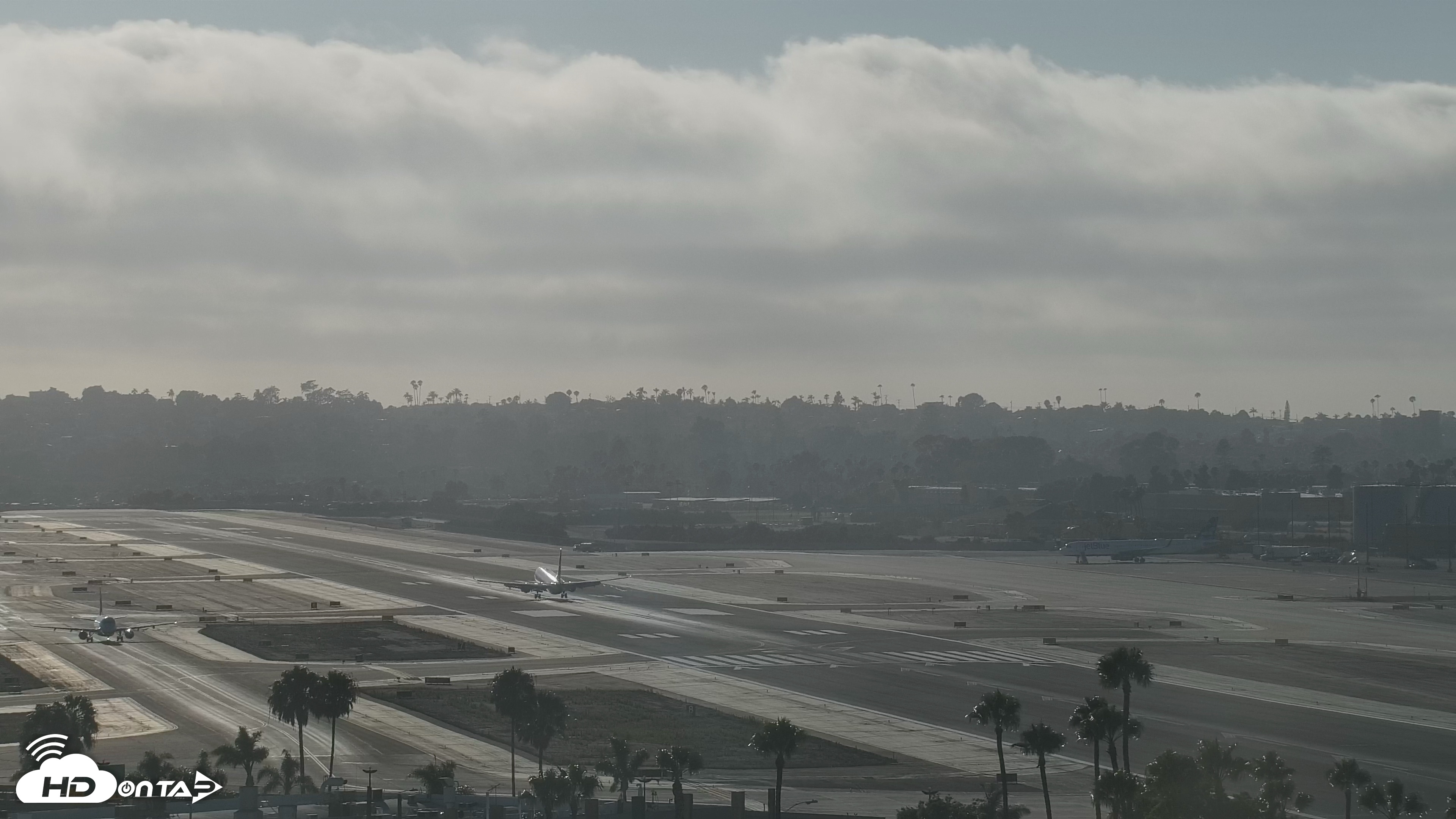 Snapshot of SD Lindbergh Airport & Bay Live Webcam taken Jul 22, 2026, 6:35pm PDT