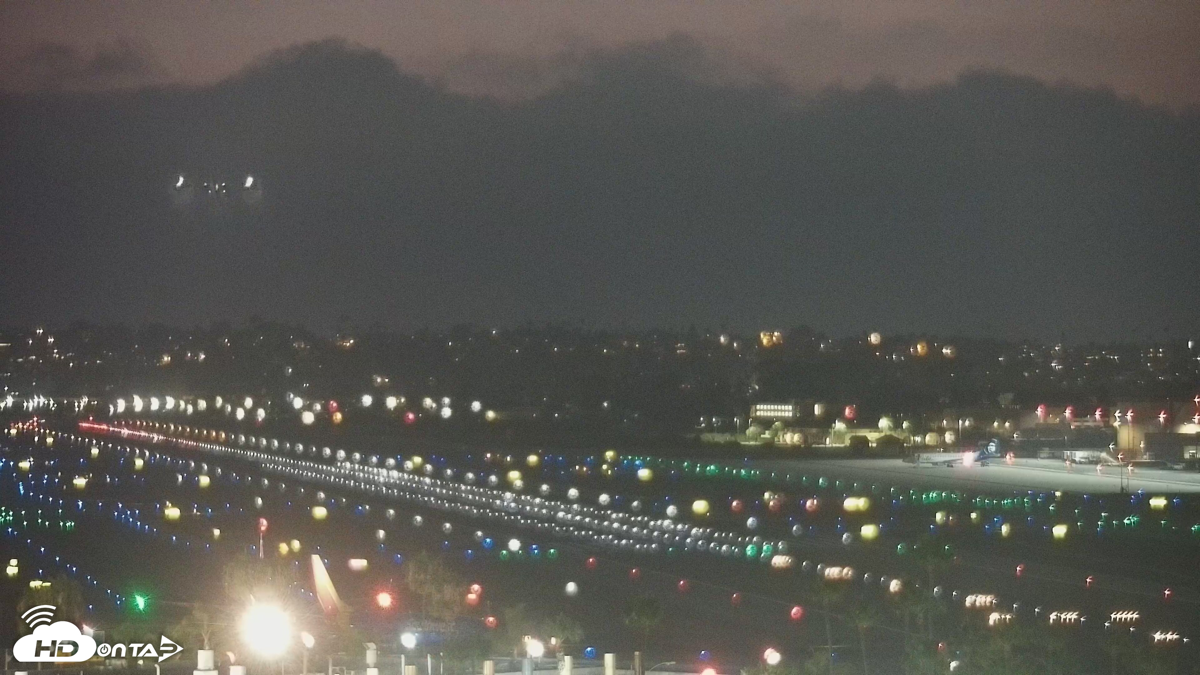 Snapshot of SD Lindbergh Airport & Bay Live Webcam taken Jul 18, 2026, 8:43pm PDT