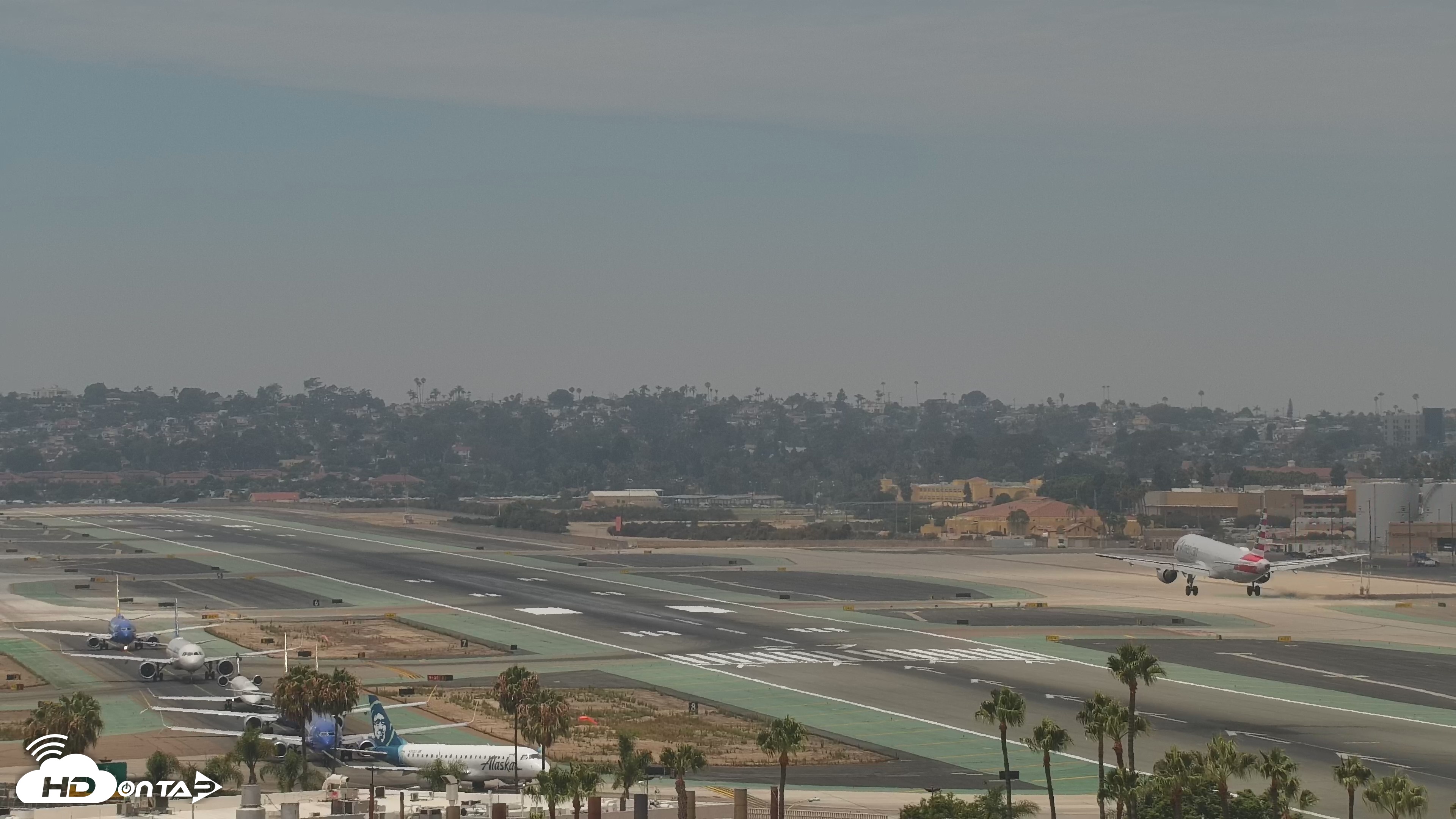 Snapshot of SD Lindbergh Airport & Bay Live Webcam taken Jul 20, 2026, 12:43pm PDT