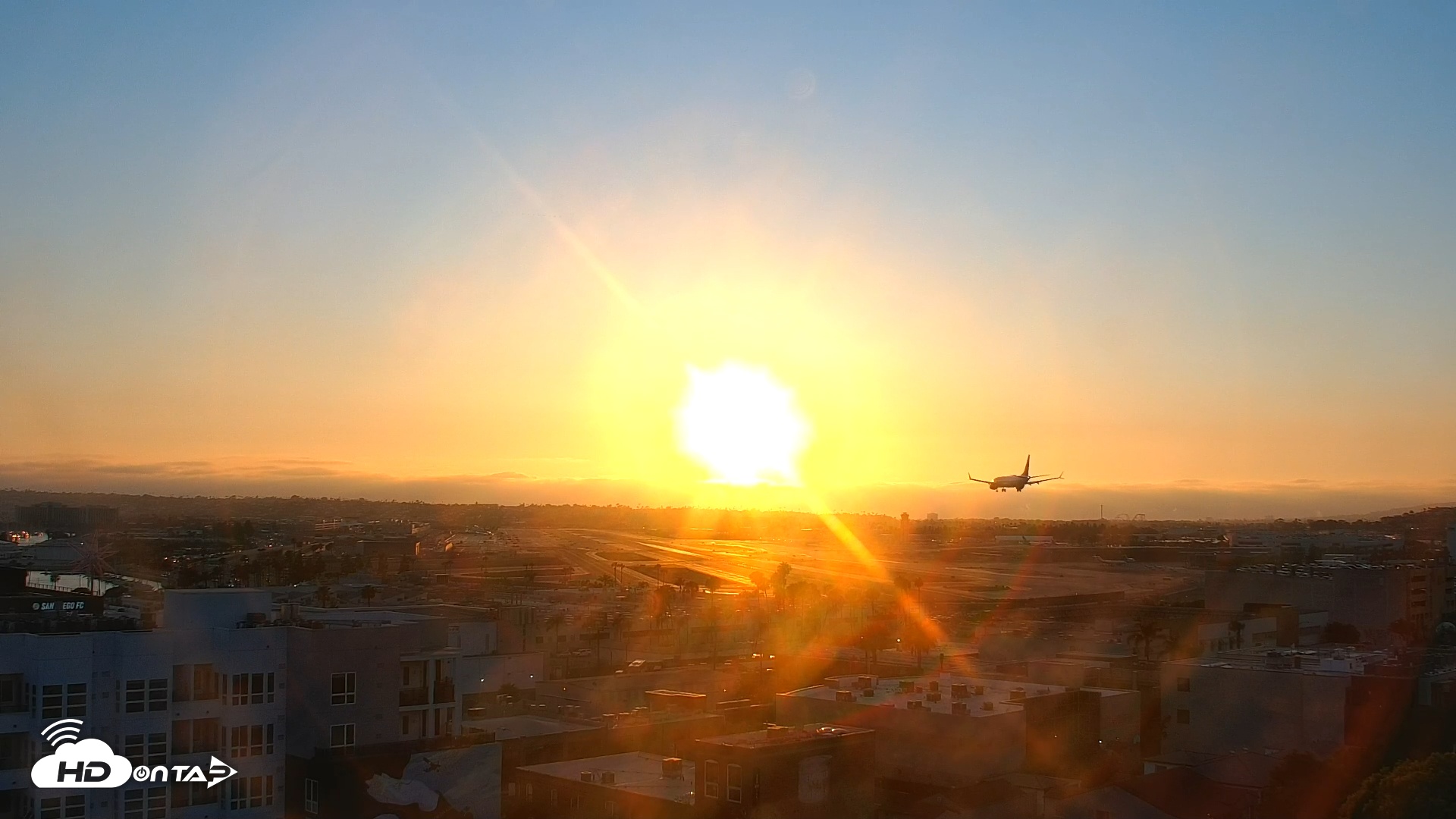 Snapshot of SD Lindbergh Airport & Bay Live Webcam taken Jul 4, 2025, 7:40pm PDT
