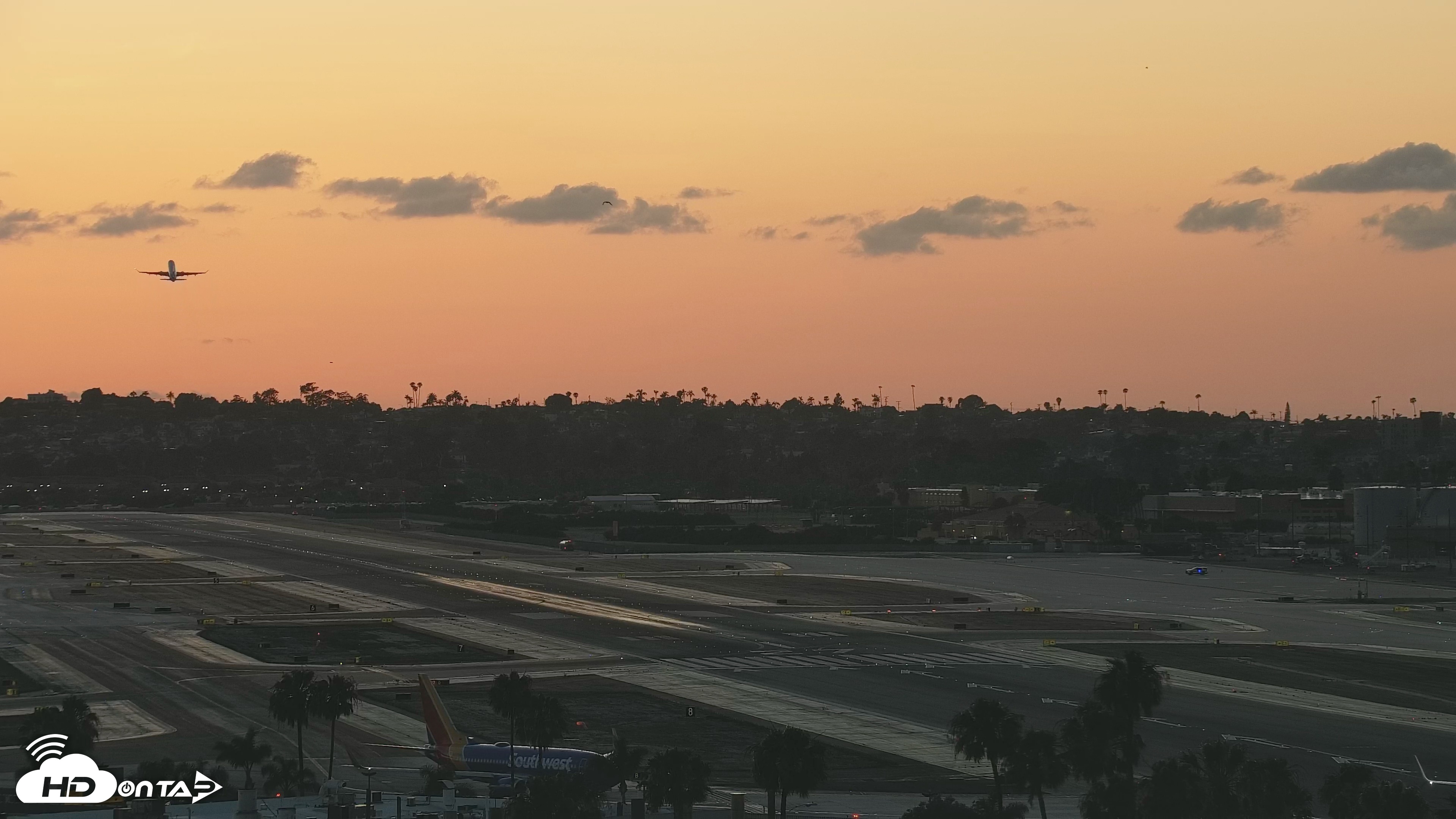 Snapshot of SD Lindbergh Airport & Bay Live Webcam taken Apr 27, 2026, 7:33pm PDT