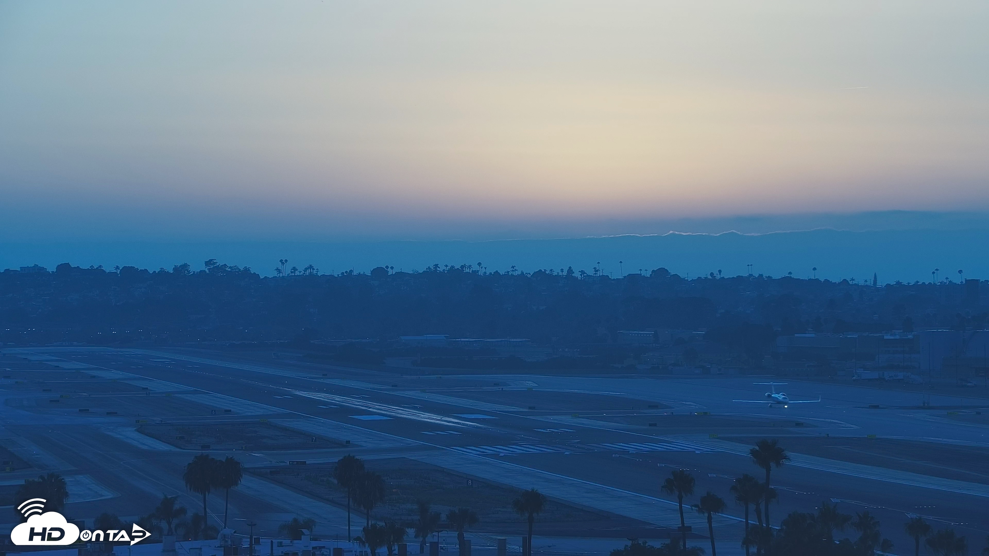 Snapshot of SD Lindbergh Airport & Bay Live Webcam taken Jul 19, 2026, 7:53pm PDT