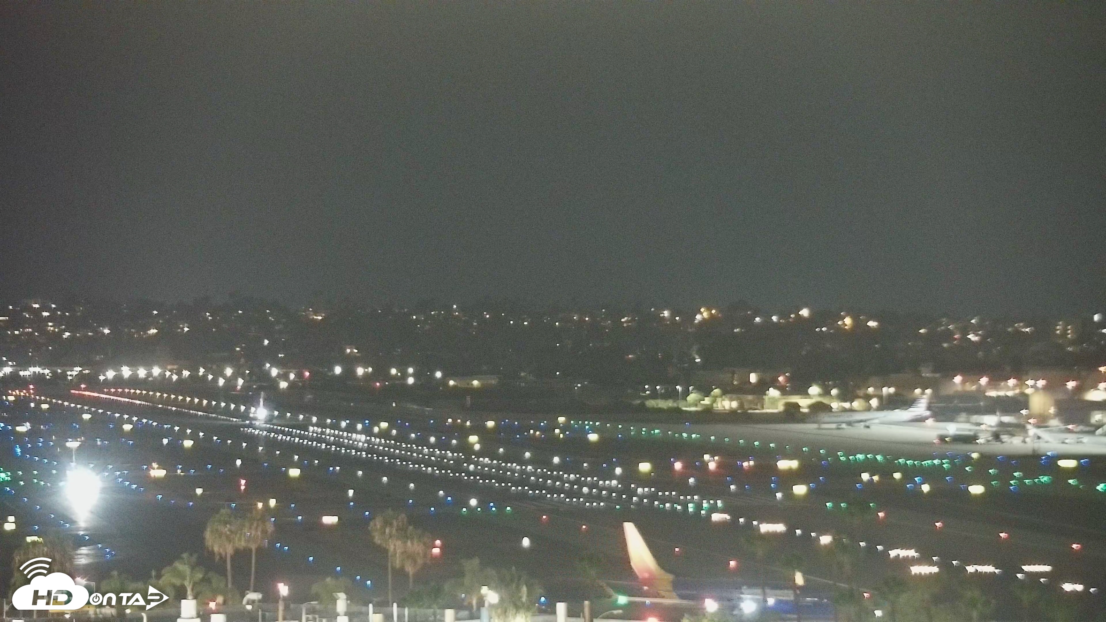 Snapshot of SD Lindbergh Airport & Bay Live Webcam taken Jun 24, 2026, 9:19pm PDT