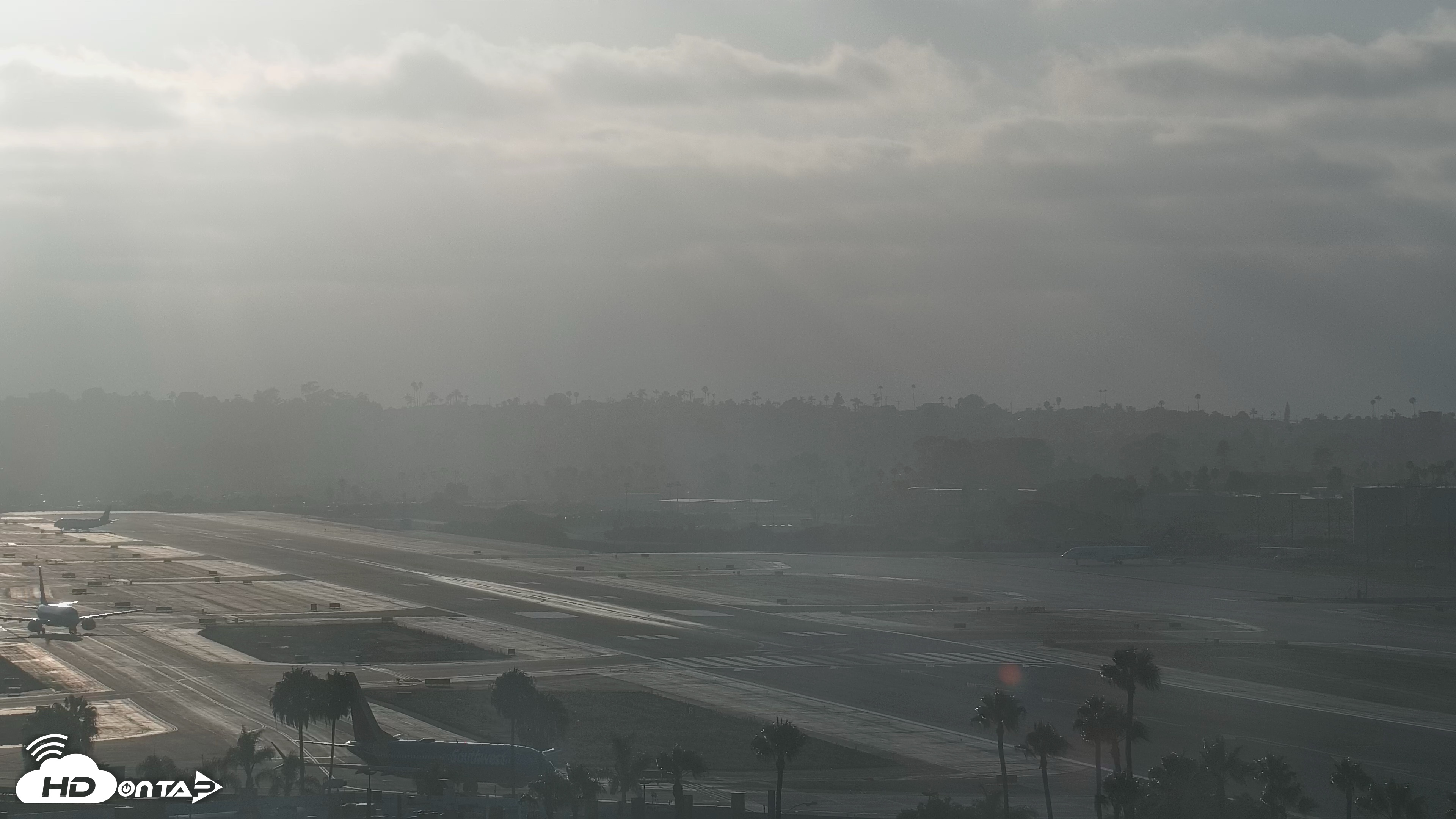 Snapshot of SD Lindbergh Airport & Bay Live Webcam taken Jul 30, 2026, 7:14pm PDT