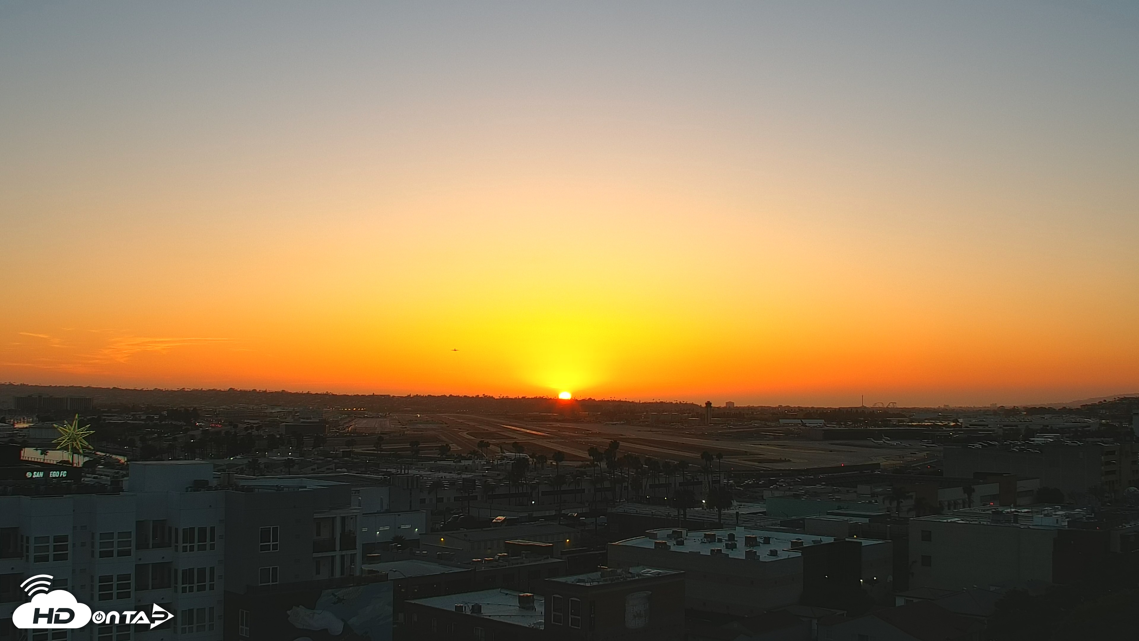 Snapshot of SD Lindbergh Airport & Bay Live Webcam taken May 20, 2025, 7:42pm PDT