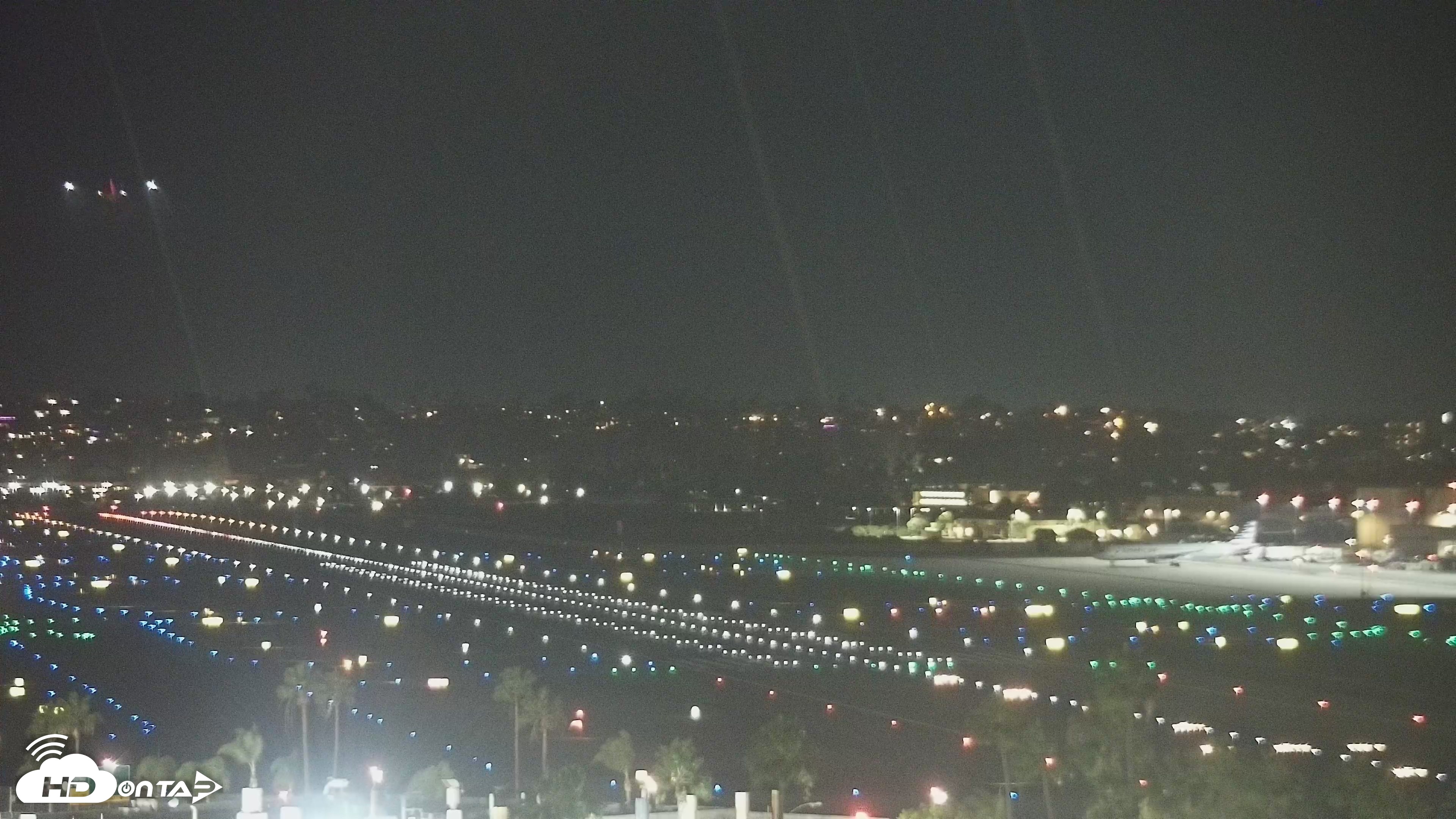 Snapshot of SD Lindbergh Airport & Bay Live Webcam taken Oct 6, 2026, 7:55pm PDT