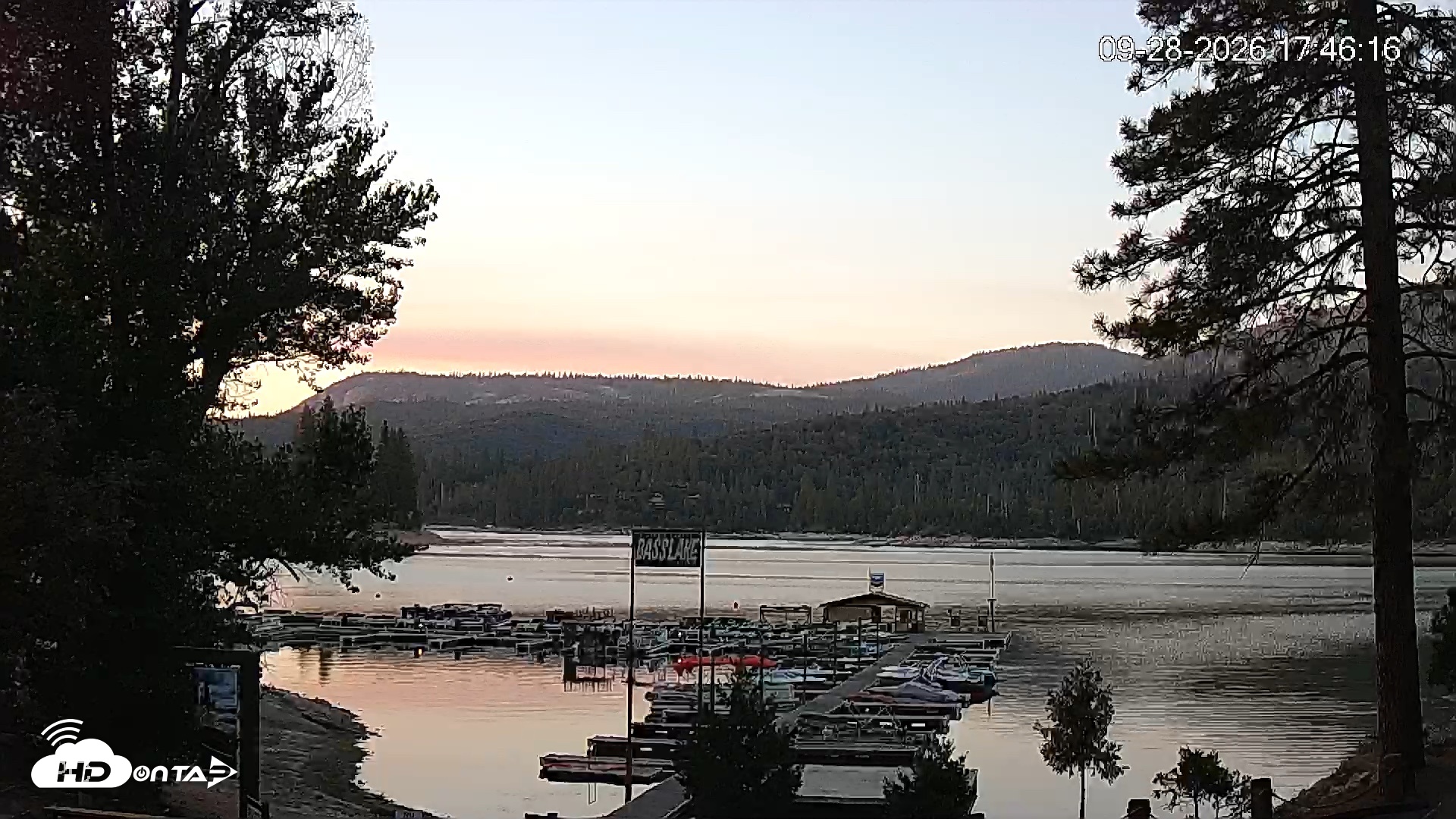 Snapshot of Miller's Landing Resort on Bass Lake Live Webcam taken Sep 28, 2026, 6:46pm PDT