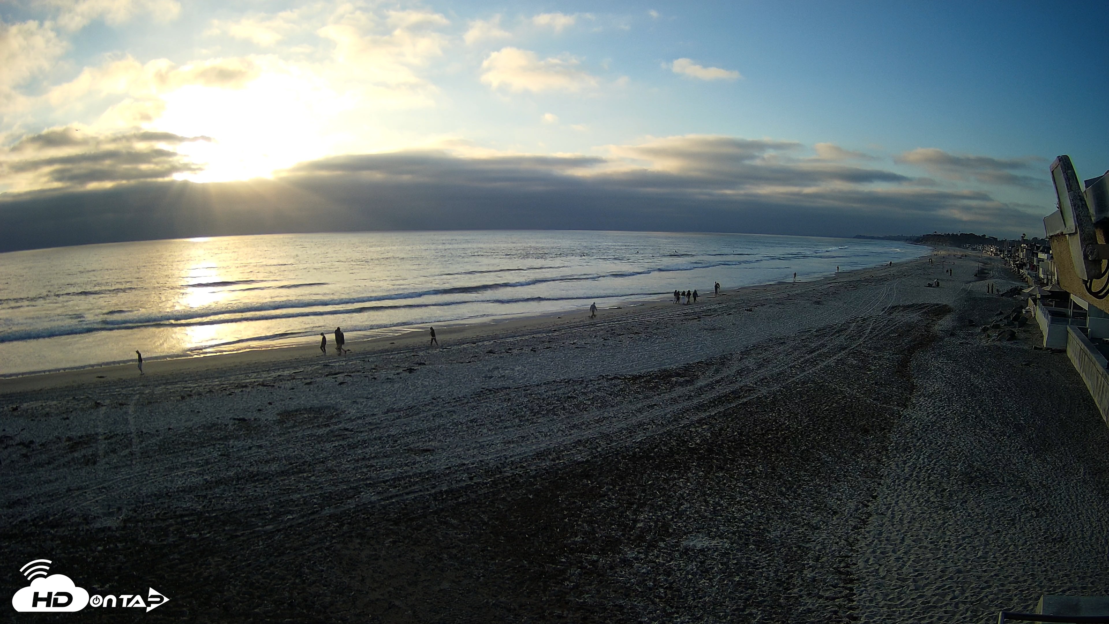 Snapshot of 17th St. Del Mar Beach - 4K NW View Live Cam taken May 7, 2026, 6:55pm PDT