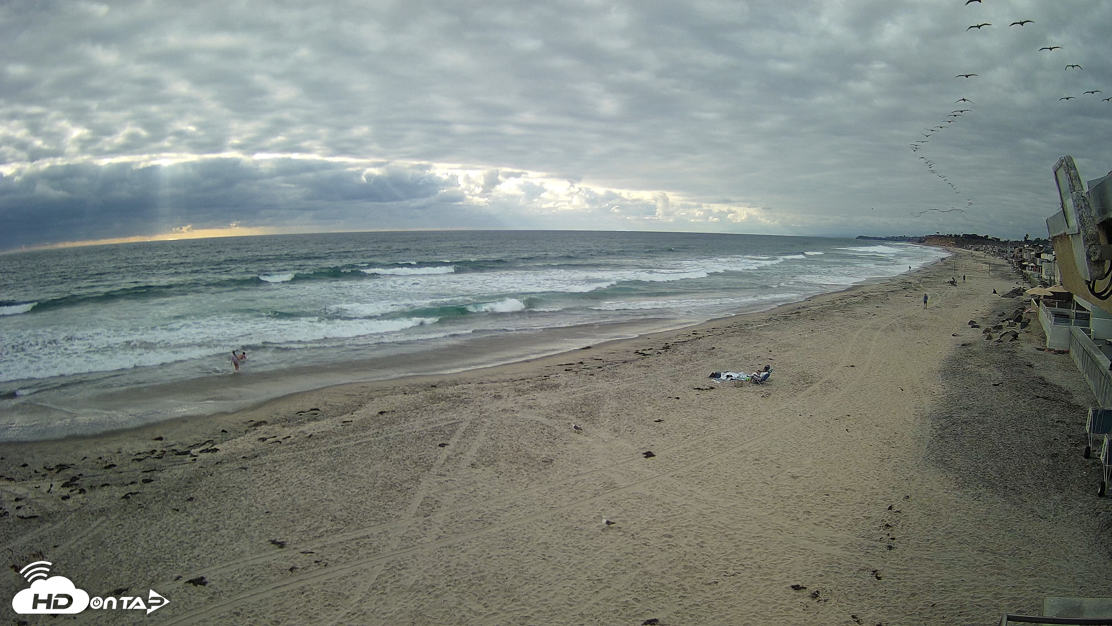 Snapshot of 17th St. Del Mar Beach - 4K NW View Live Cam taken May 26, 2026, 5:57pm PDT