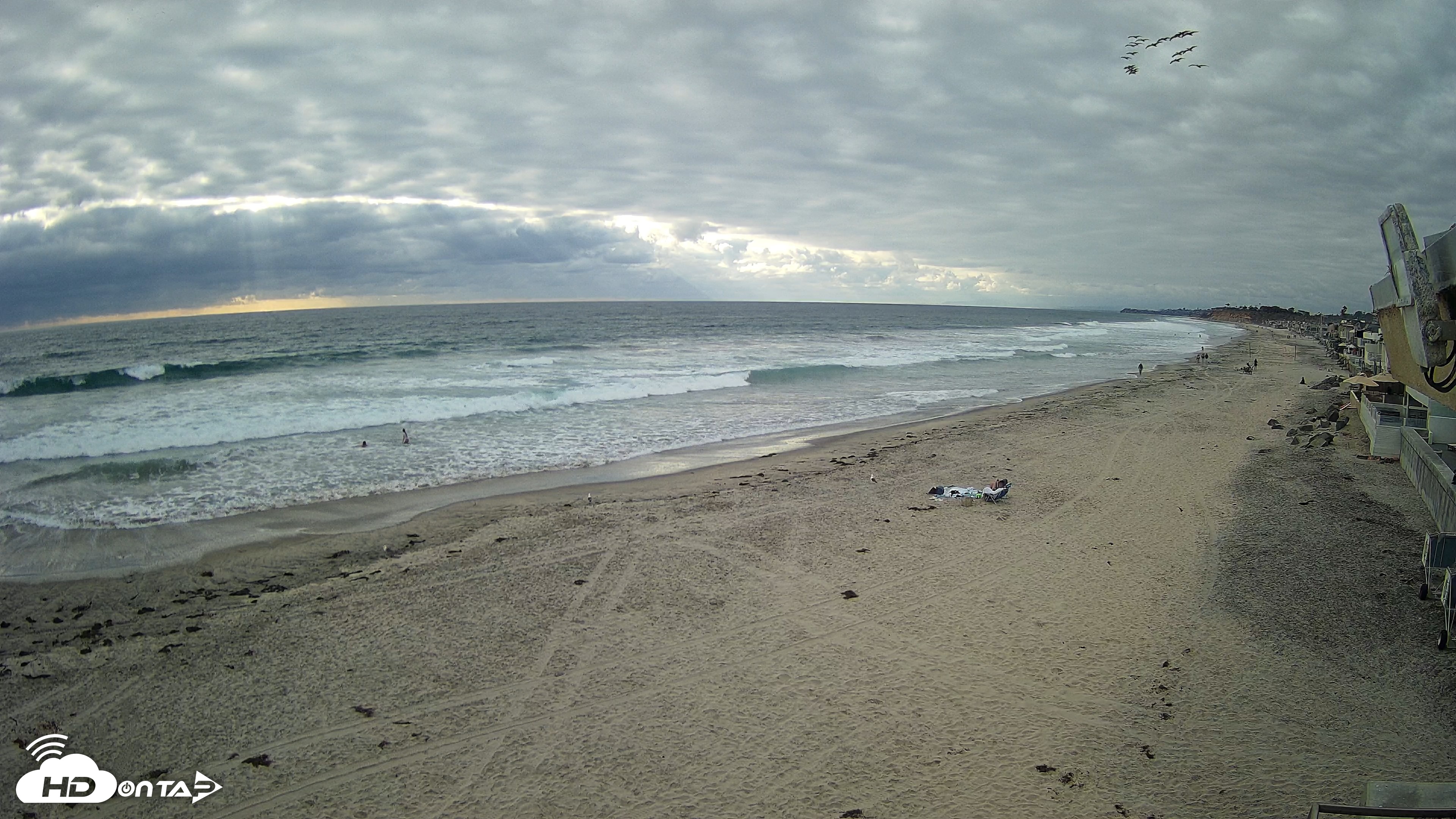 Snapshot of 17th St. Del Mar Beach - 4K NW View Live Cam taken May 26, 2026, 6:01pm PDT
