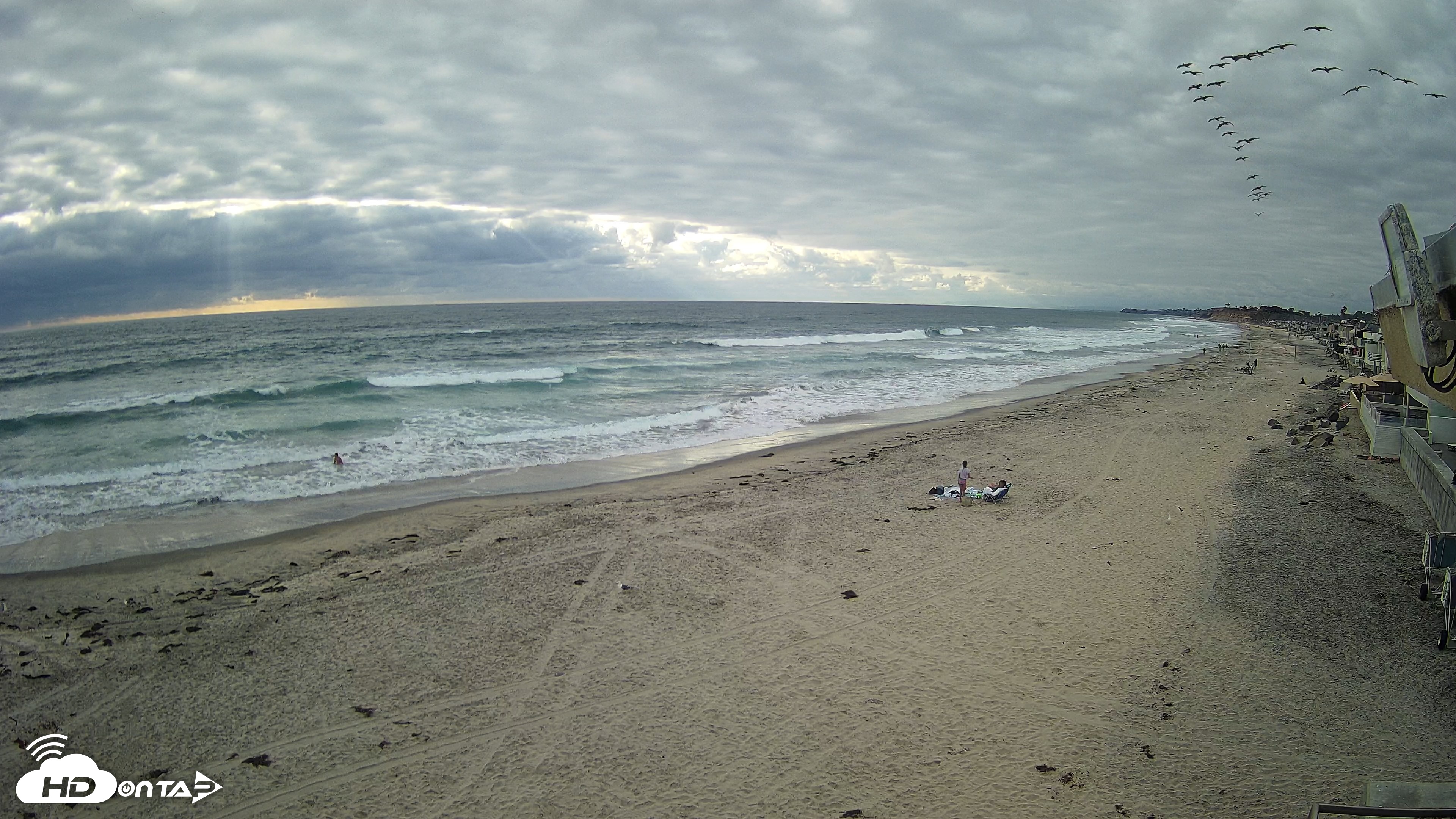 Snapshot of 17th St. Del Mar Beach - 4K NW View Live Cam taken May 26, 2026, 5:59pm PDT