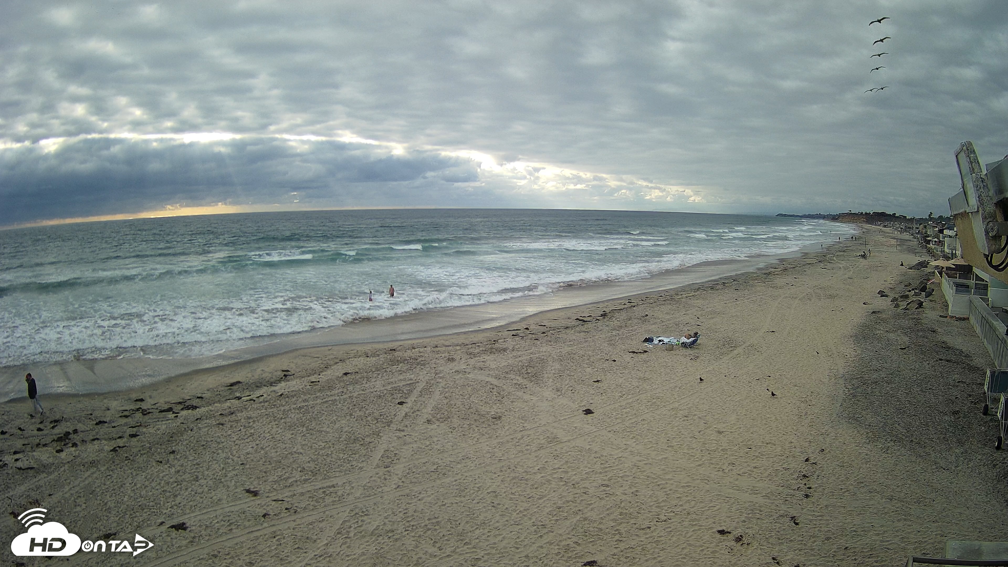 Snapshot of 17th St. Del Mar Beach - 4K NW View Live Cam taken May 26, 2026, 6:03pm PDT
