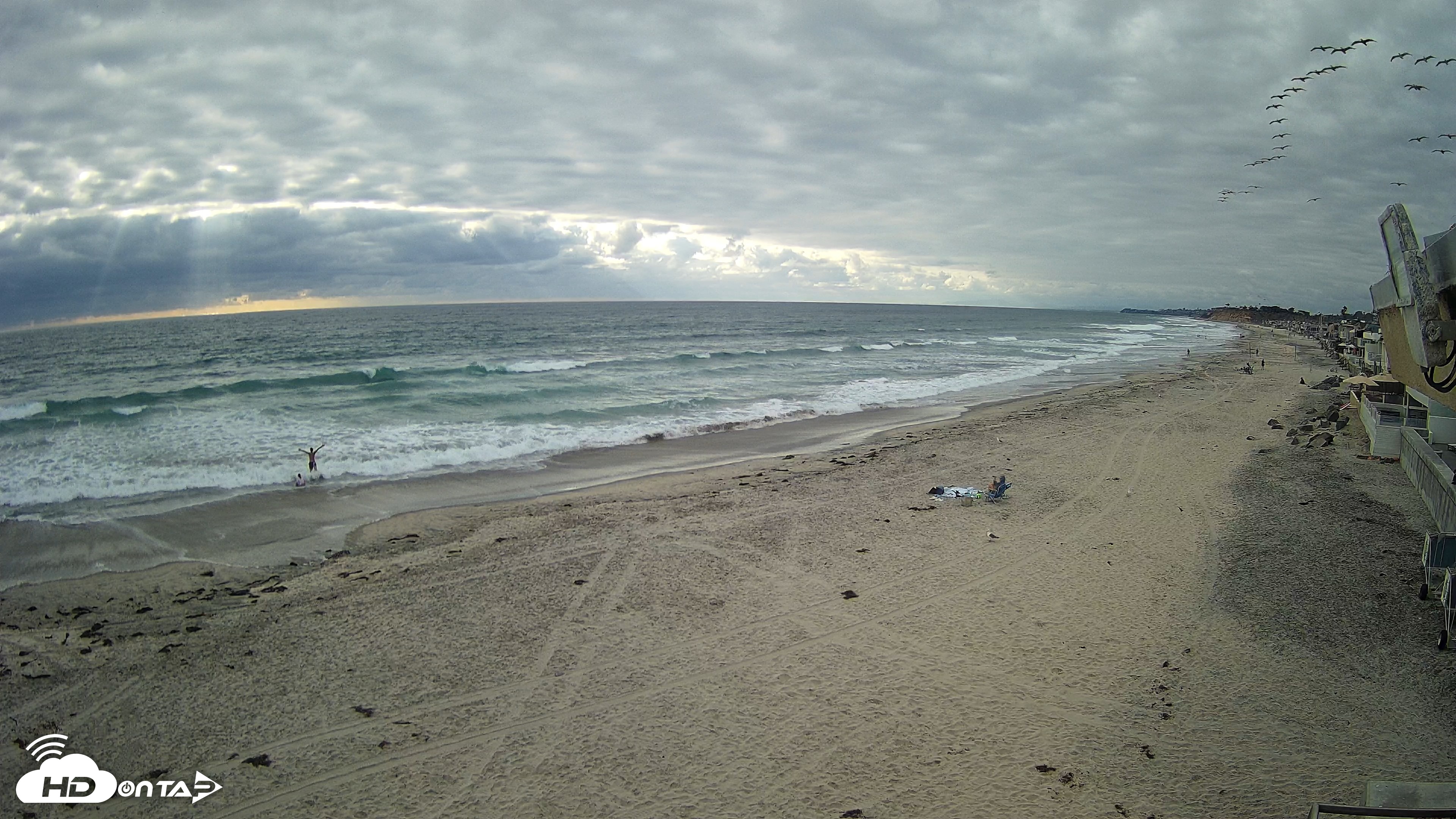 Snapshot of 17th St. Del Mar Beach - 4K NW View Live Cam taken May 26, 2026, 5:57pm PDT
