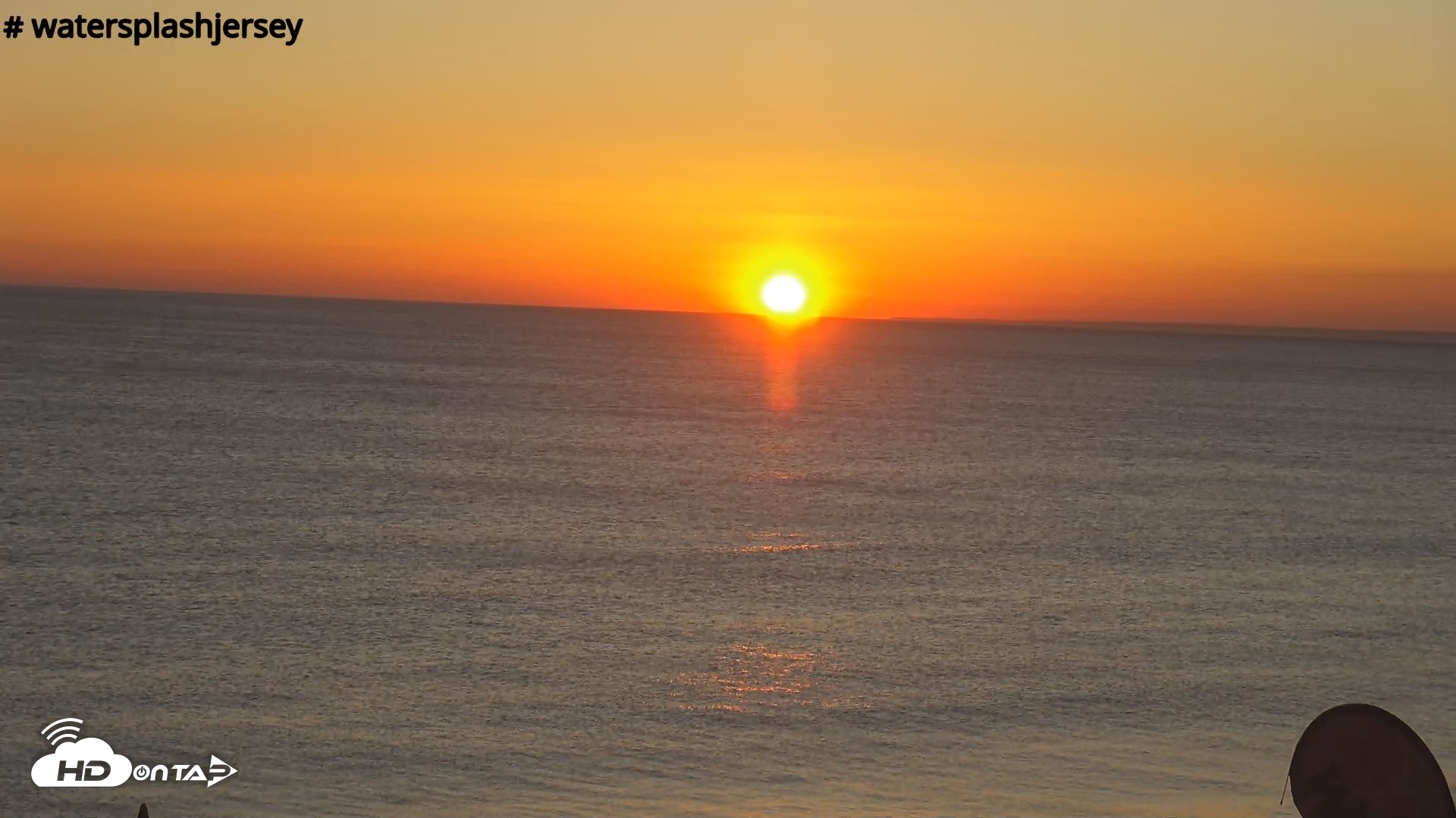 Snapshot of St. Quens Bay Jersey Island Live Webcam taken Jul 12, 2025, 9:10pm BST