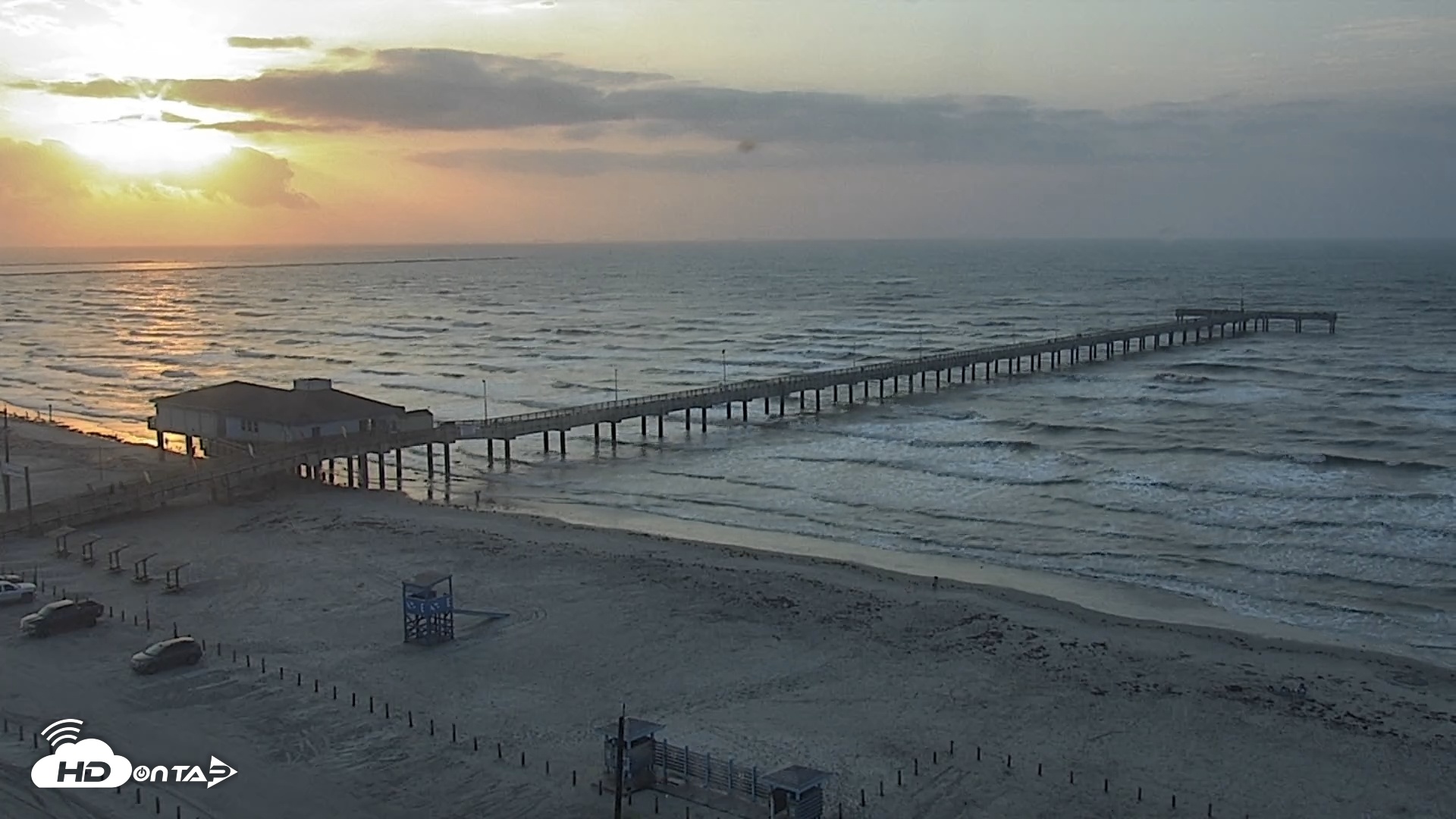 Snapshot of The Dunes - Port Aransas Live Beach Cam taken May 18, 2025, 7:04am CDT