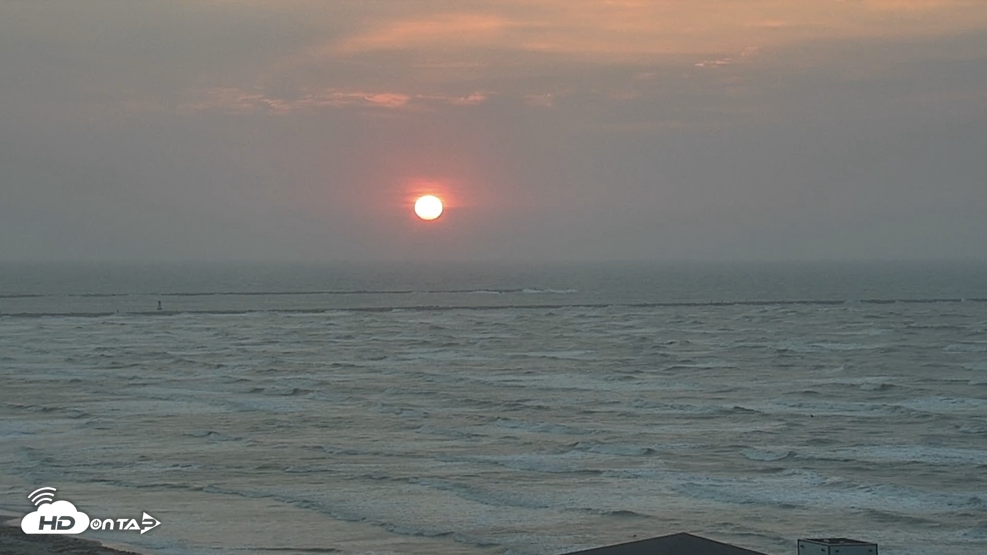 Snapshot of The Dunes - Port Aransas Live Beach Cam taken May 19, 2025, 6:43am CDT