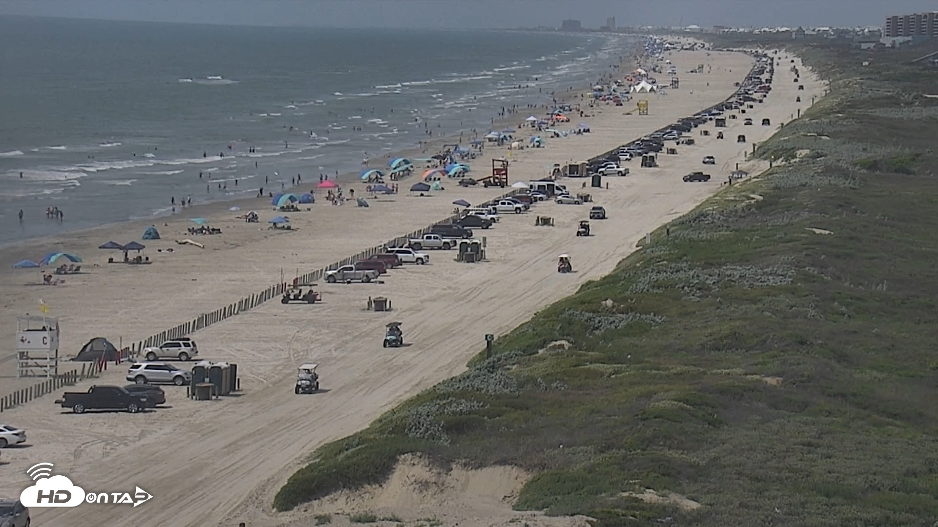 Snapshot of The Dunes - Port Aransas Live Beach Cam taken Jul 30, 2025, 11:33am CDT