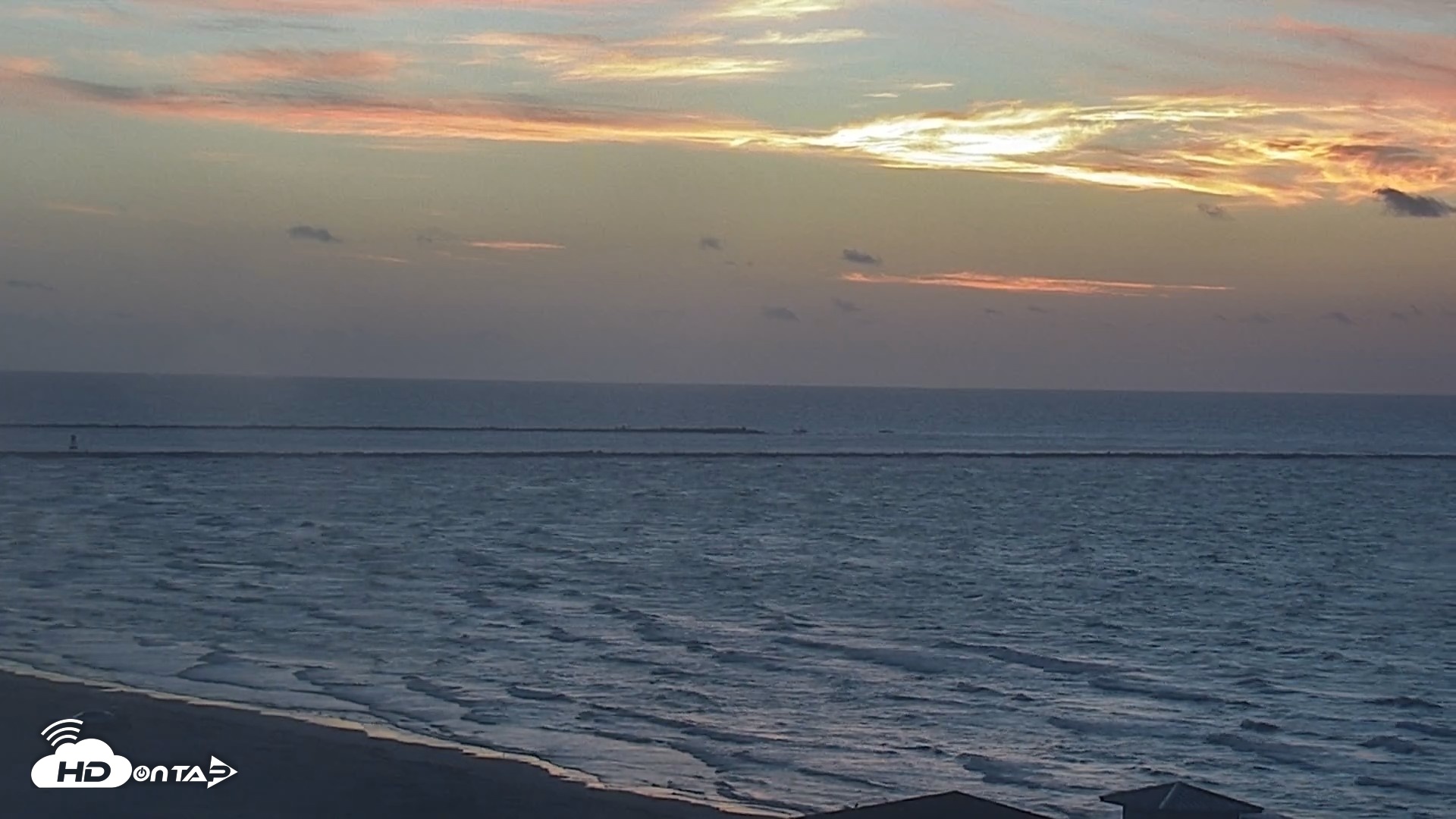 Snapshot of The Dunes - Port Aransas Live Beach Cam taken Aug 19, 2026, 6:49am CDT
