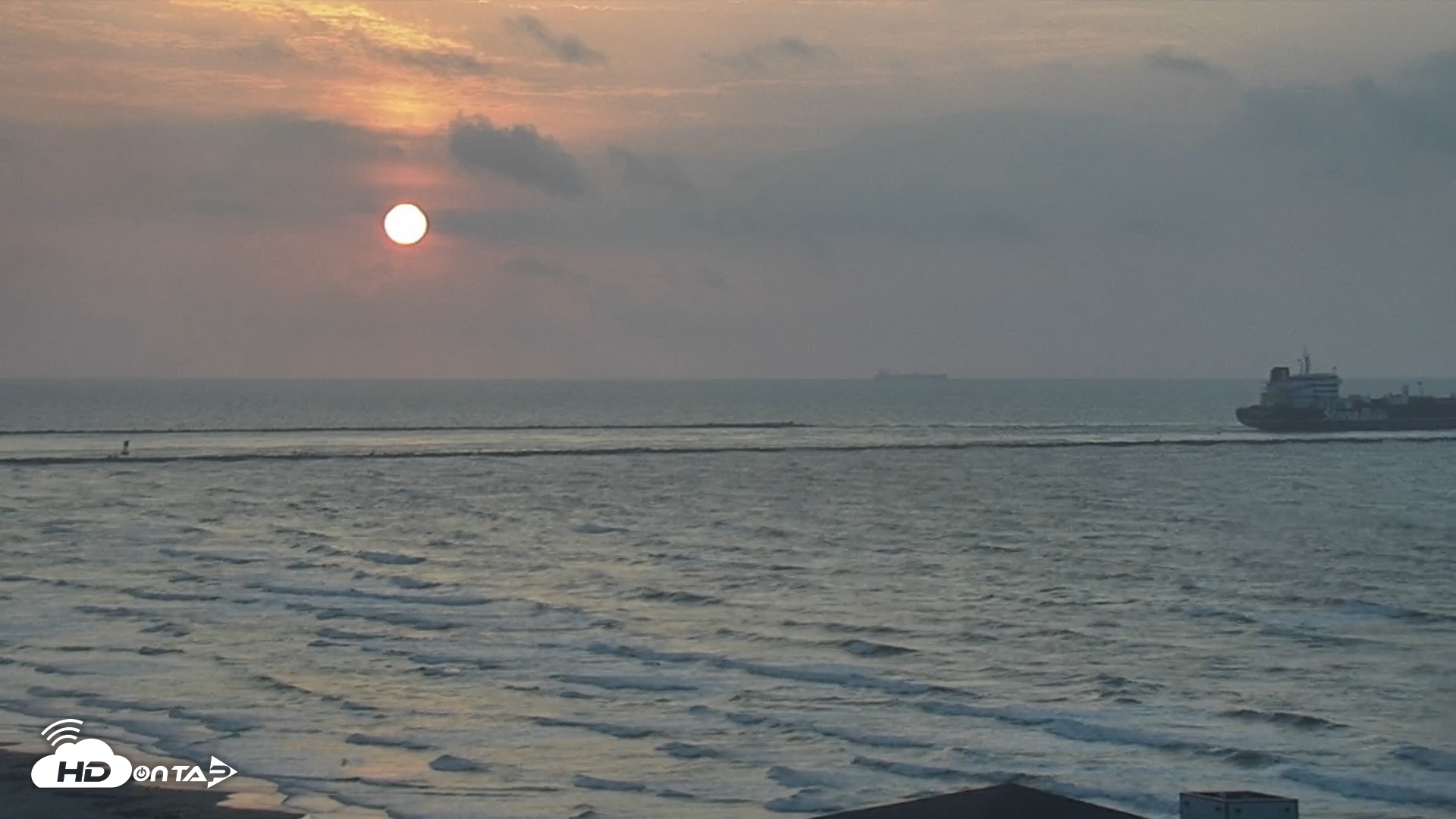 Snapshot of The Dunes - Port Aransas Live Beach Cam taken Jun 10, 2025, 6:44am CDT