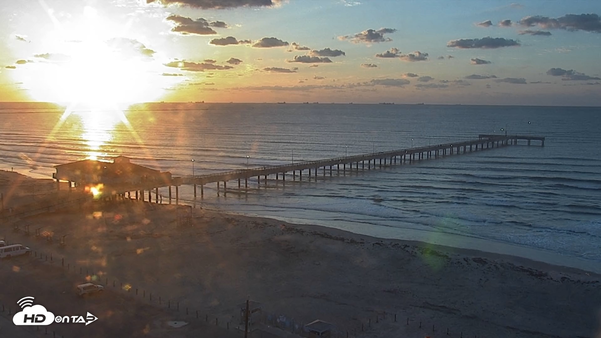Snapshot of The Dunes - Port Aransas Live Beach Cam taken May 3, 2026, 7:01am CDT