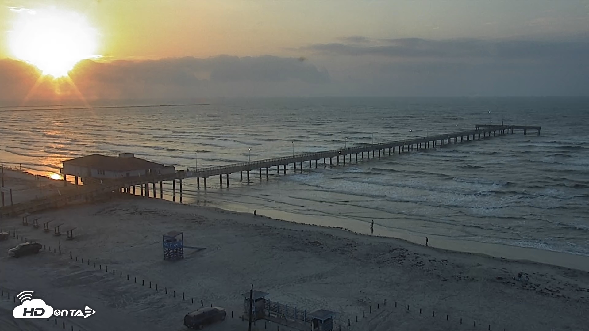 Snapshot of The Dunes - Port Aransas Live Beach Cam taken May 18, 2025, 6:57am CDT