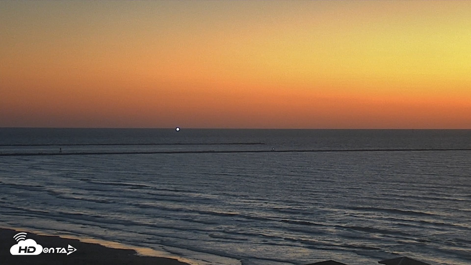 Snapshot of The Dunes - Port Aransas Live Beach Cam taken Oct 23, 2026, 7:08am CDT